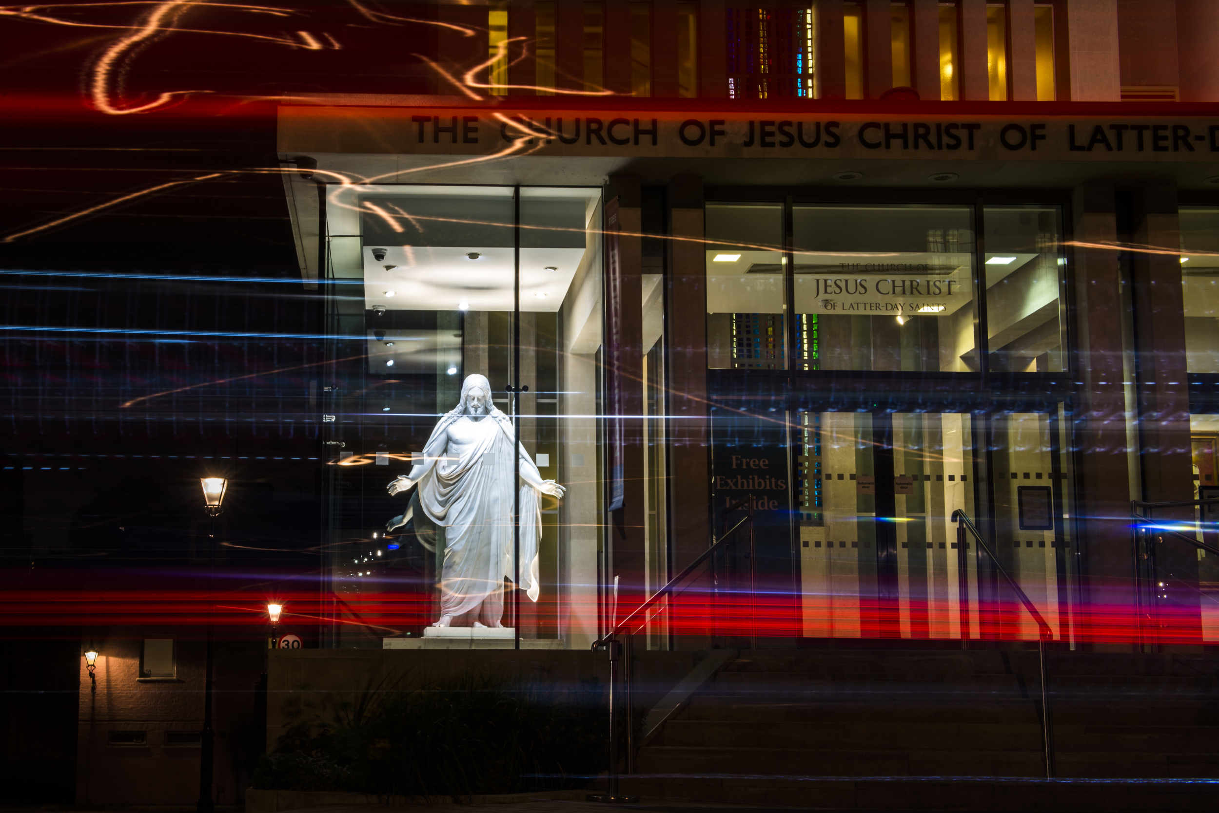  A statue of Jesus is illuminated at night at the Church of Jesus Christ of Latter Day Saints.  