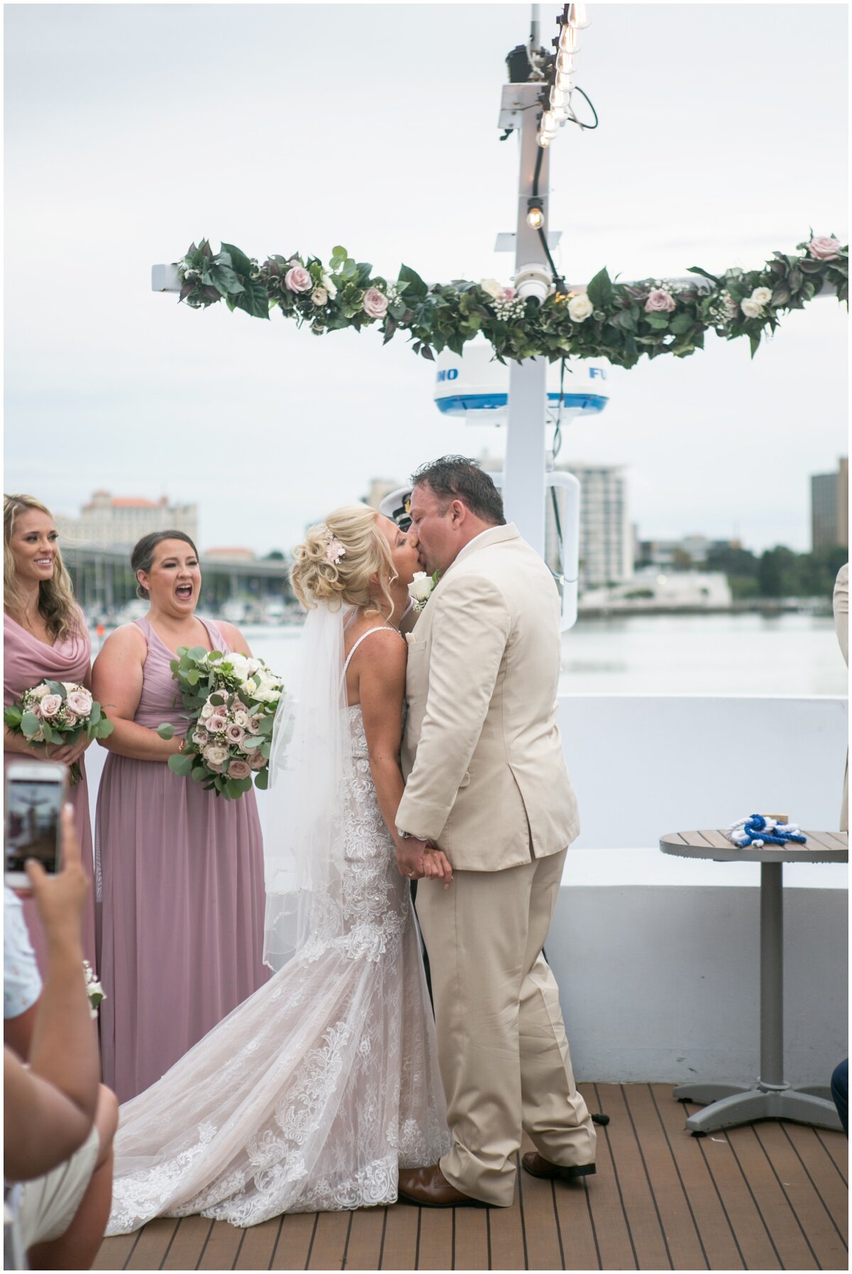  Bride and groom kissing on Yacht Starship 