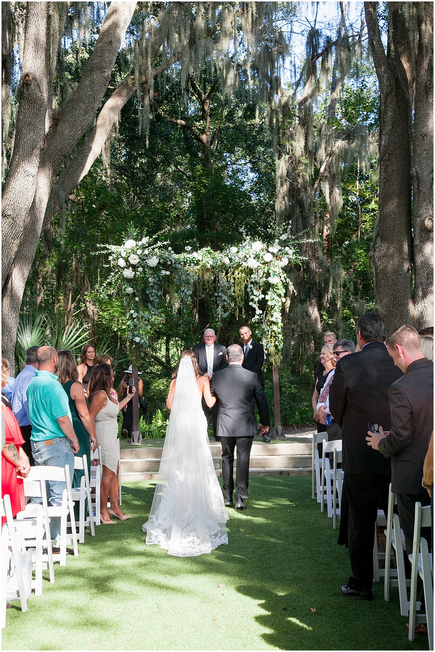  bride and father walking down the aisle 