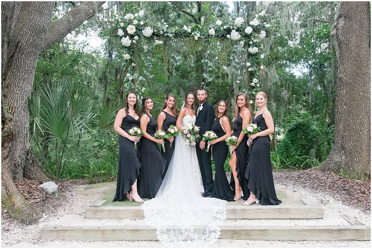  bride and groom with the bridesmaids 