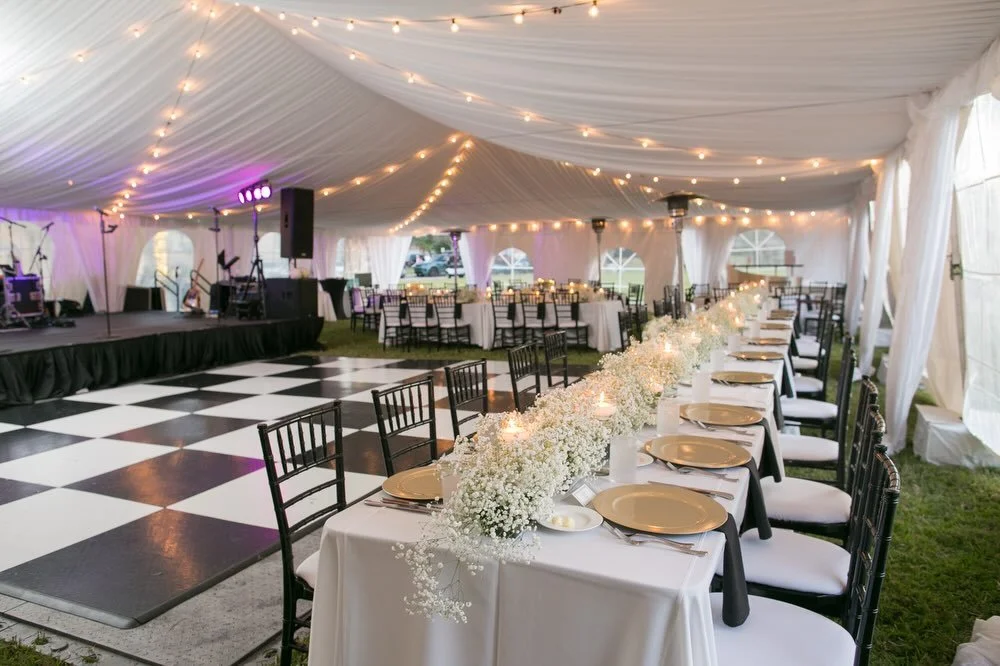 On this frozen Florida day I&rsquo;m here for the cozy details ❄️🤍 🖤 

Meg &amp; Steve&rsquo;s reception was the definition of warm and welcoming. A glowing tent complete with heaters set the scene, while their timeless black and white palette carr
