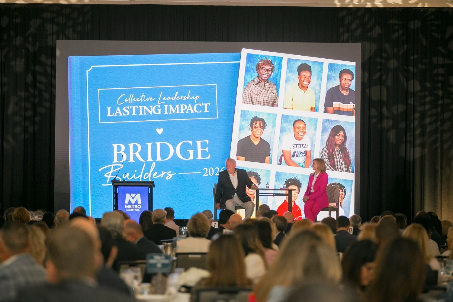 ohn C Maxwell on stage at Metro Ministries Bridge Builders 2026 Tampa gala — Carrie Wildes Photography