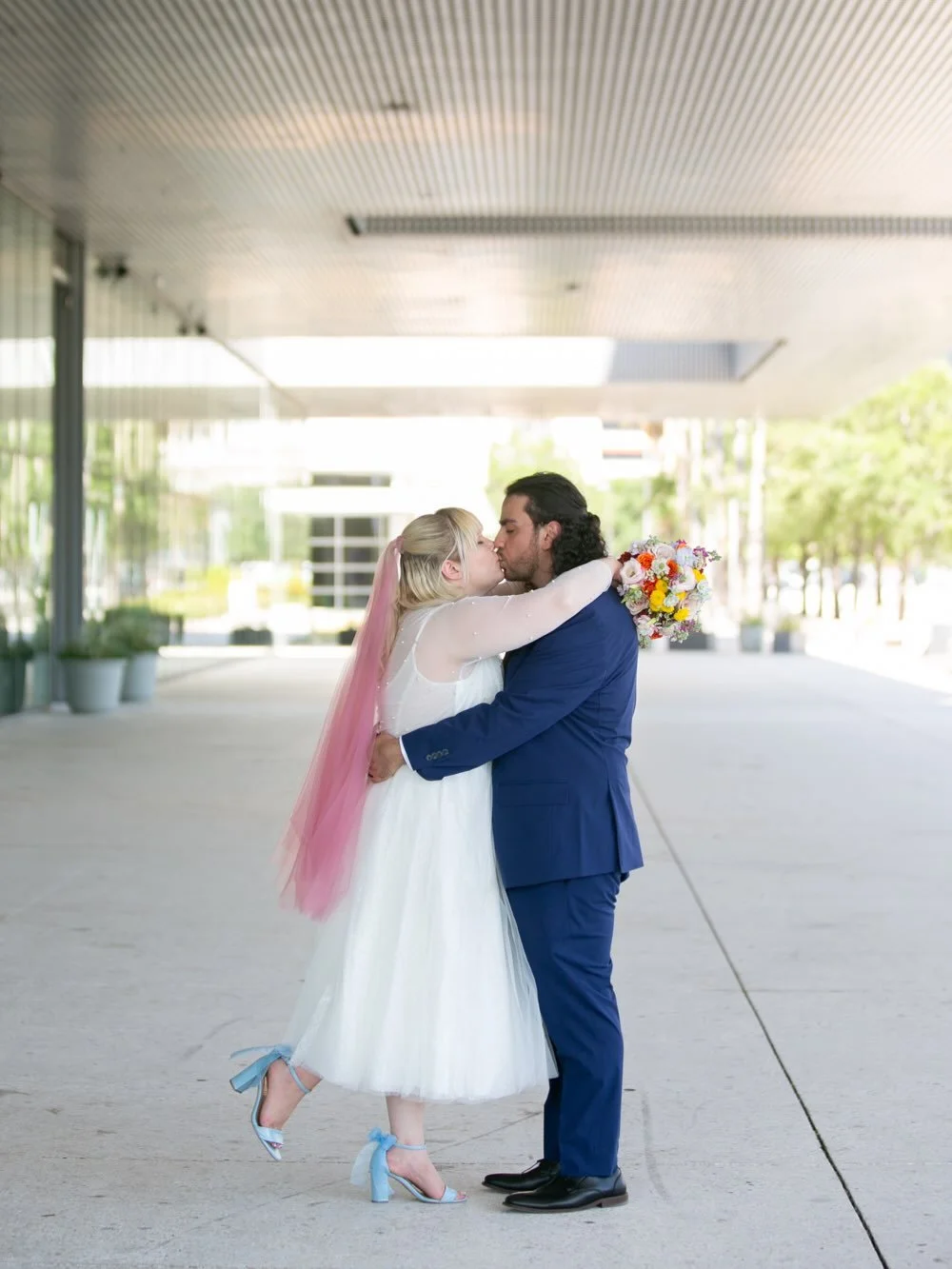 Bonnie + Omar made it official in the most perfectly them kind of way &mdash; a private courthouse ceremony followed by portraits all across downtown Tampa. 

Bonnie&rsquo;s pink veil floating in the breeze. That wildly gorgeous bouquet bursting with