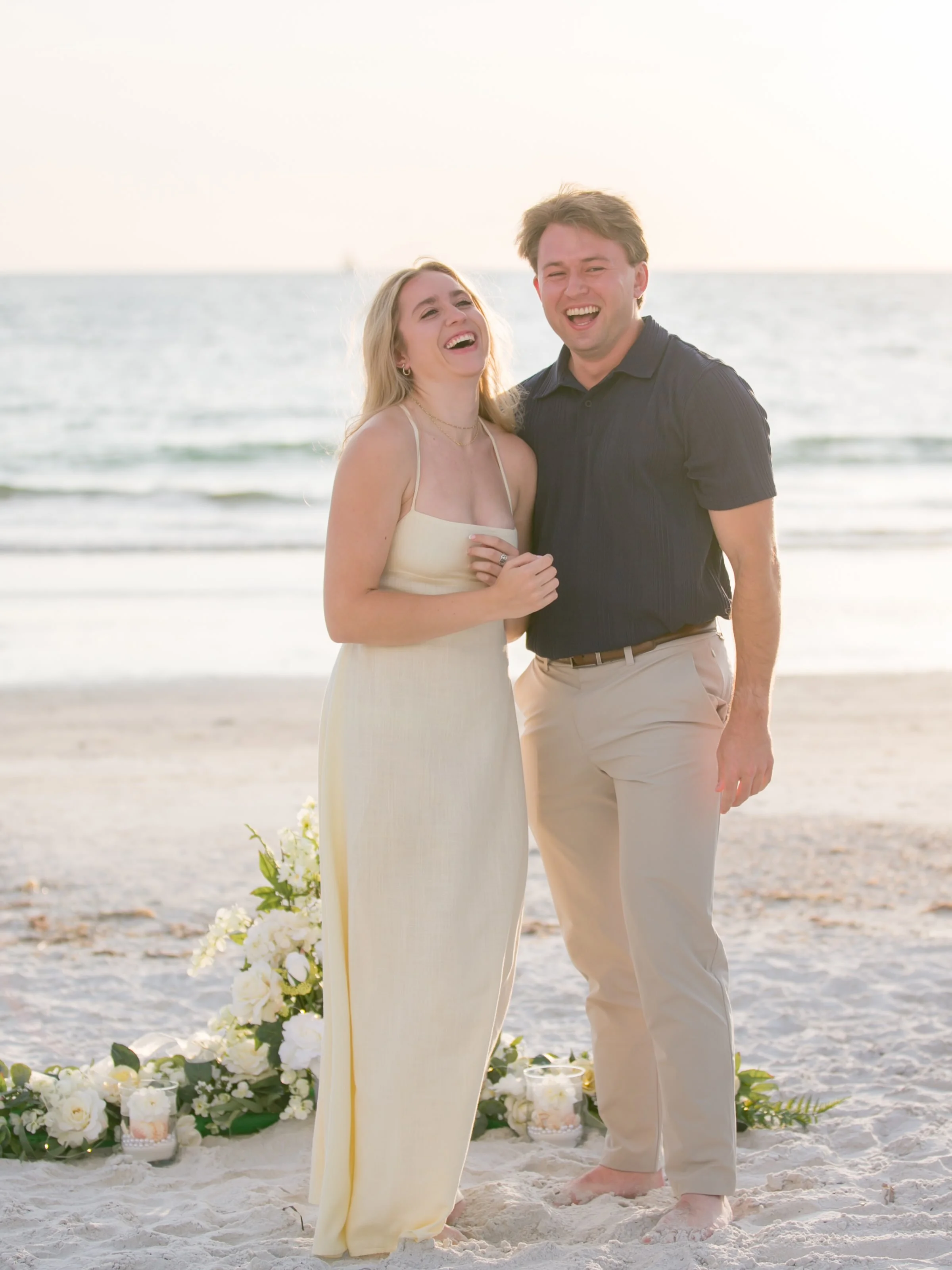 He had a ring box custom engraved with &ldquo;G &amp; A&rdquo; and the date, before she even knew there was a date 💍

Aaron and Grace were on vacation from Atlanta when he pulled off the ultimate surprise at Sand Key Beach.  A golden hour walk on th