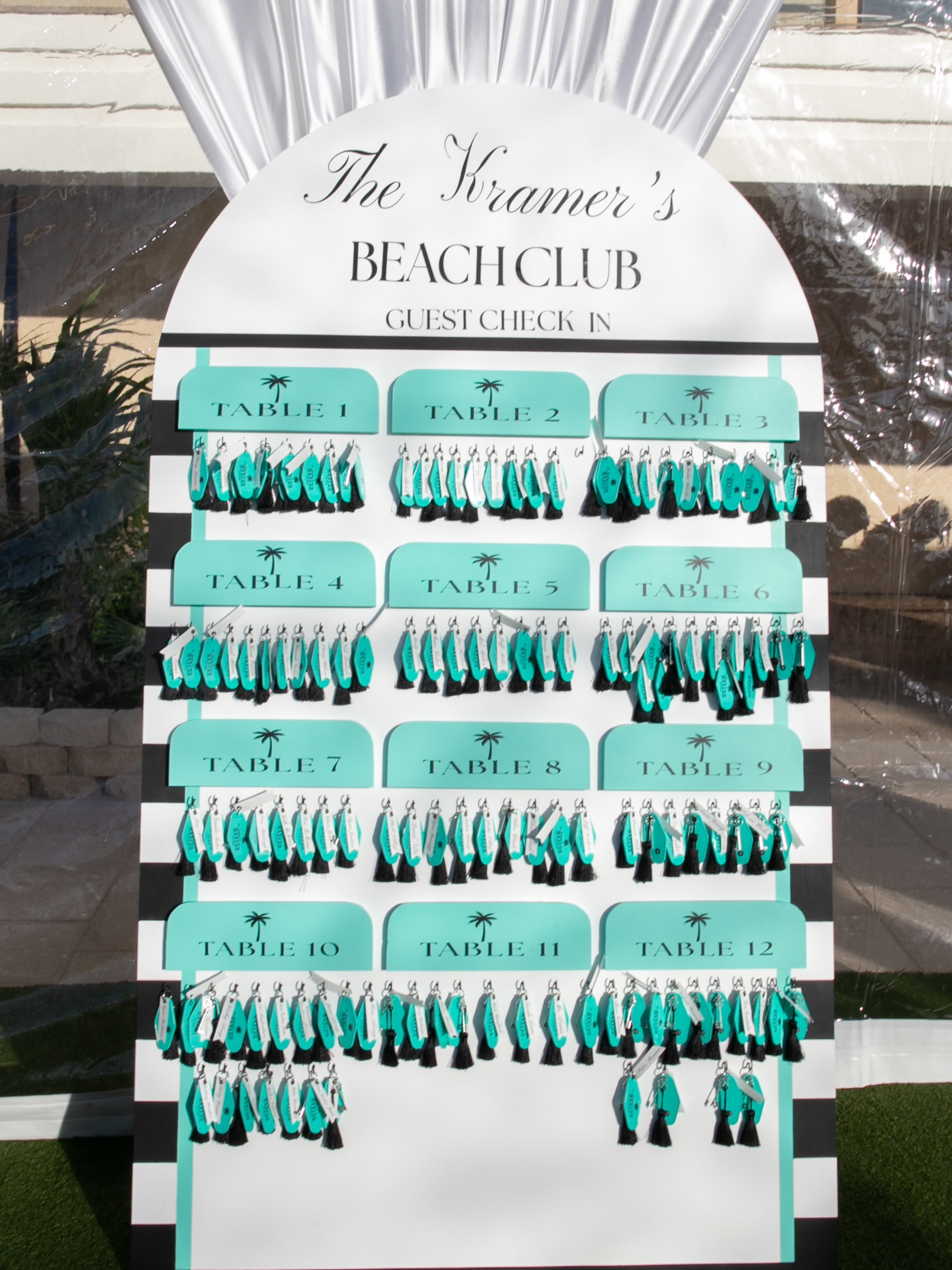 Welcome to The Kramers&rsquo; Beach Club 🌴

Stacey + Kris turned the lawn at @sandpearlresort into a private club of their own, open only to the people they love most! 🖤 🤍

Guests checked in like they were arriving at a seaside hideaway. Room keys