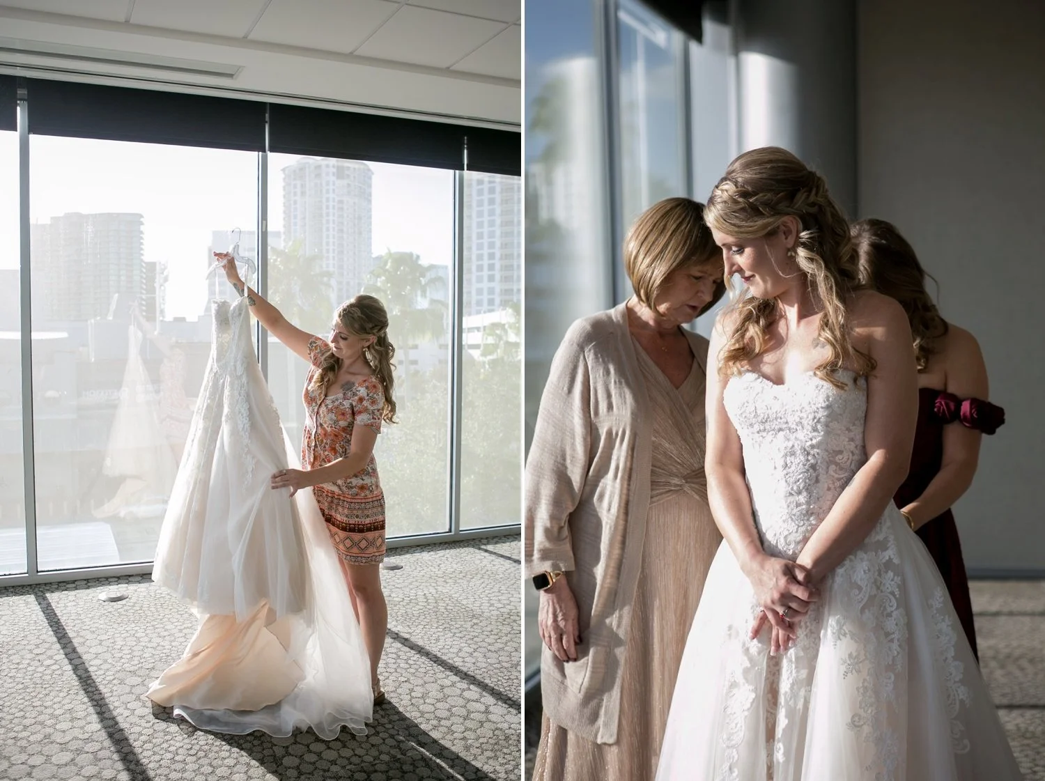 Bridesmaid holding up the wedding gown and the bride getting dressed with her mom and bridesmaid