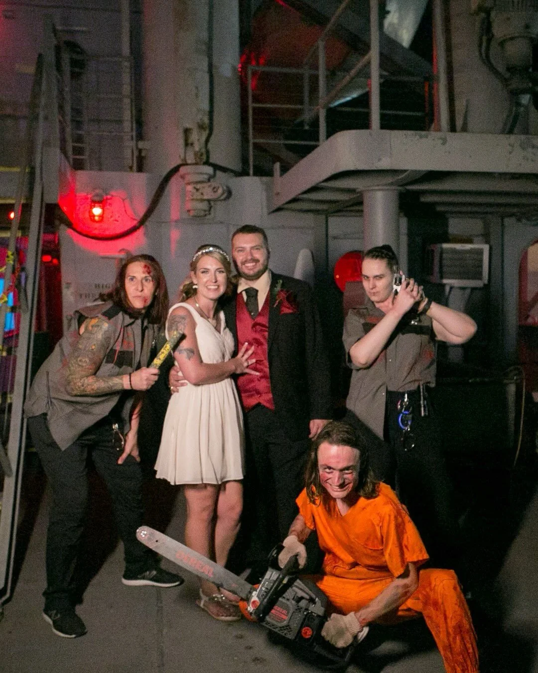 Happy Halloween!!! 🕷️🎃🧙 Most couples end their wedding night with a sparkler exit. @naui_mermaid and @jerniman97 ended theirs running from a chainsaw!!! 

One year ago, they said &ldquo;I do&rdquo; @floridaaquarium, and then Elizabeth traded her g