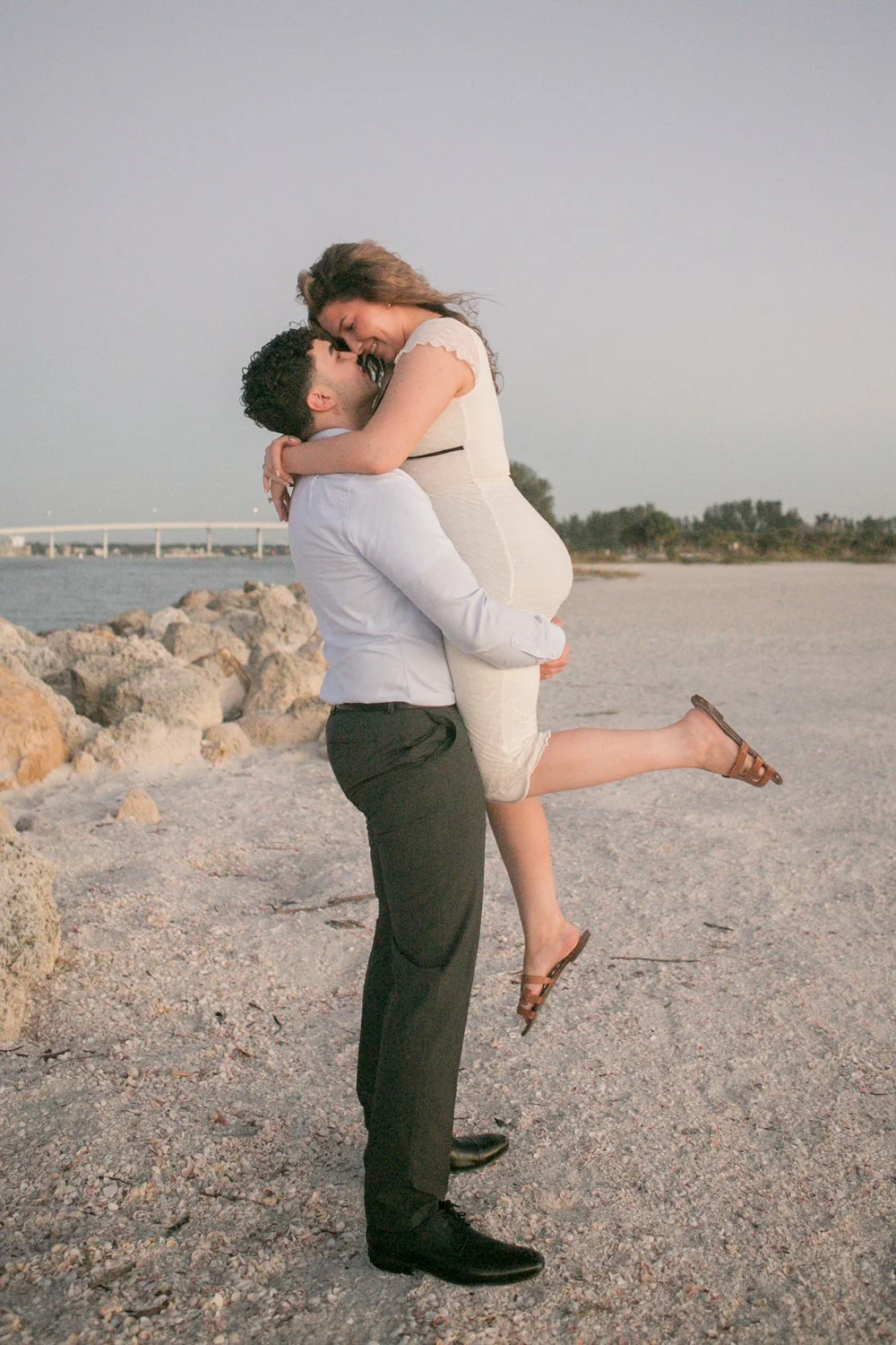 surprise-proposal-photographer-sand-key-beach-Carrie-Wildes-Photography-ramsy-mary004.jpg