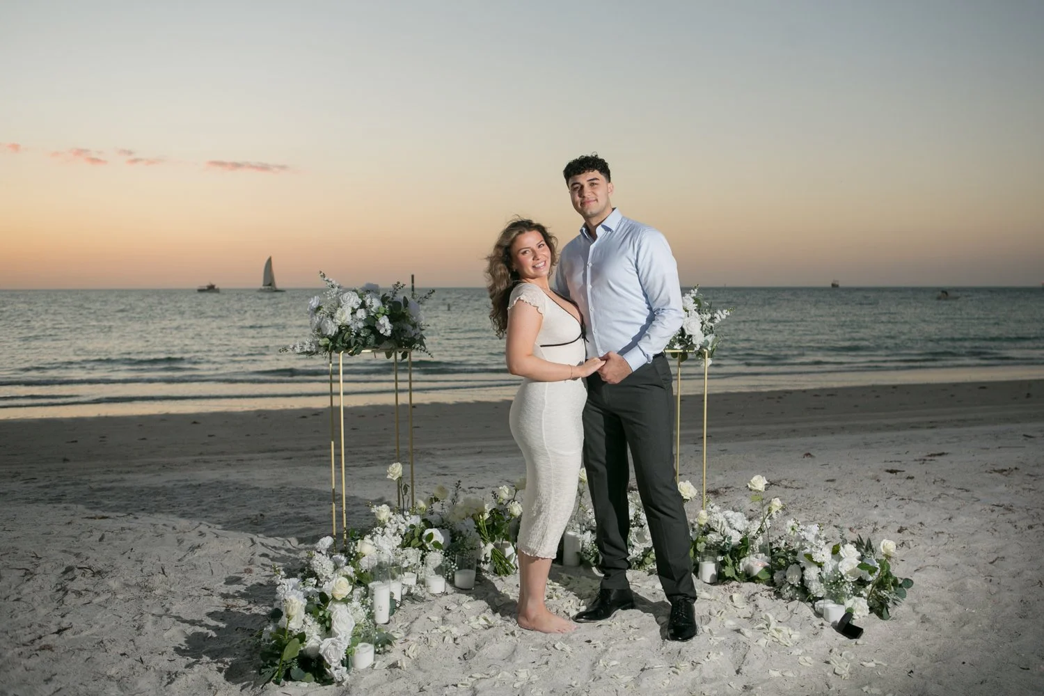 surprise-proposal-photographer-sand-key-beach-Carrie-Wildes-Photography-ramsy-mary002.jpg