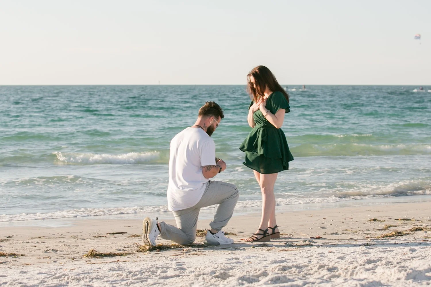 Aaron proposing to his girlfriend on sand key beach