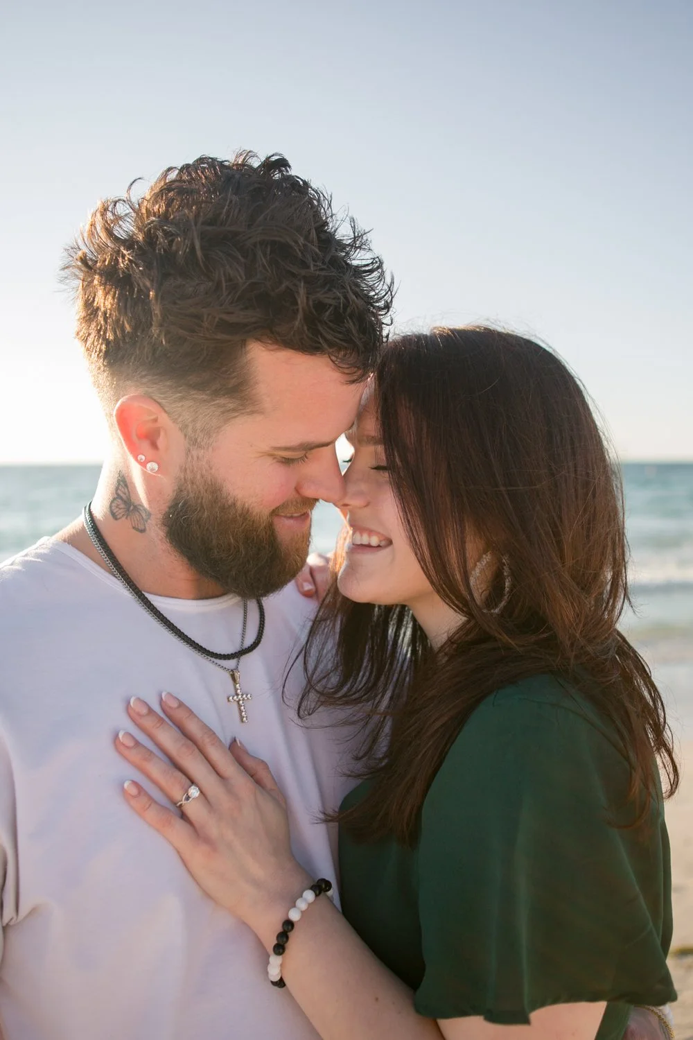 surprise-proposal-photographer-sand-key-beach-Carrie-Wildes-Photography-aaron-kayla 002.jpg