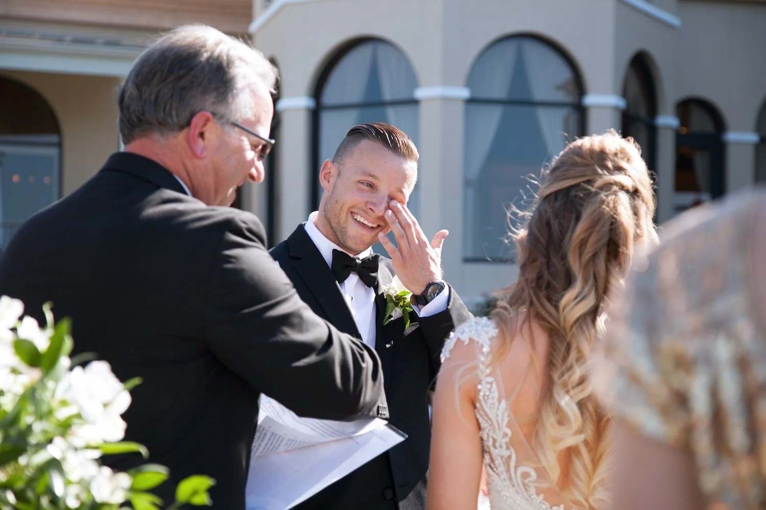 Tampa Bay Ceremony with an emotional groom seeing his bride