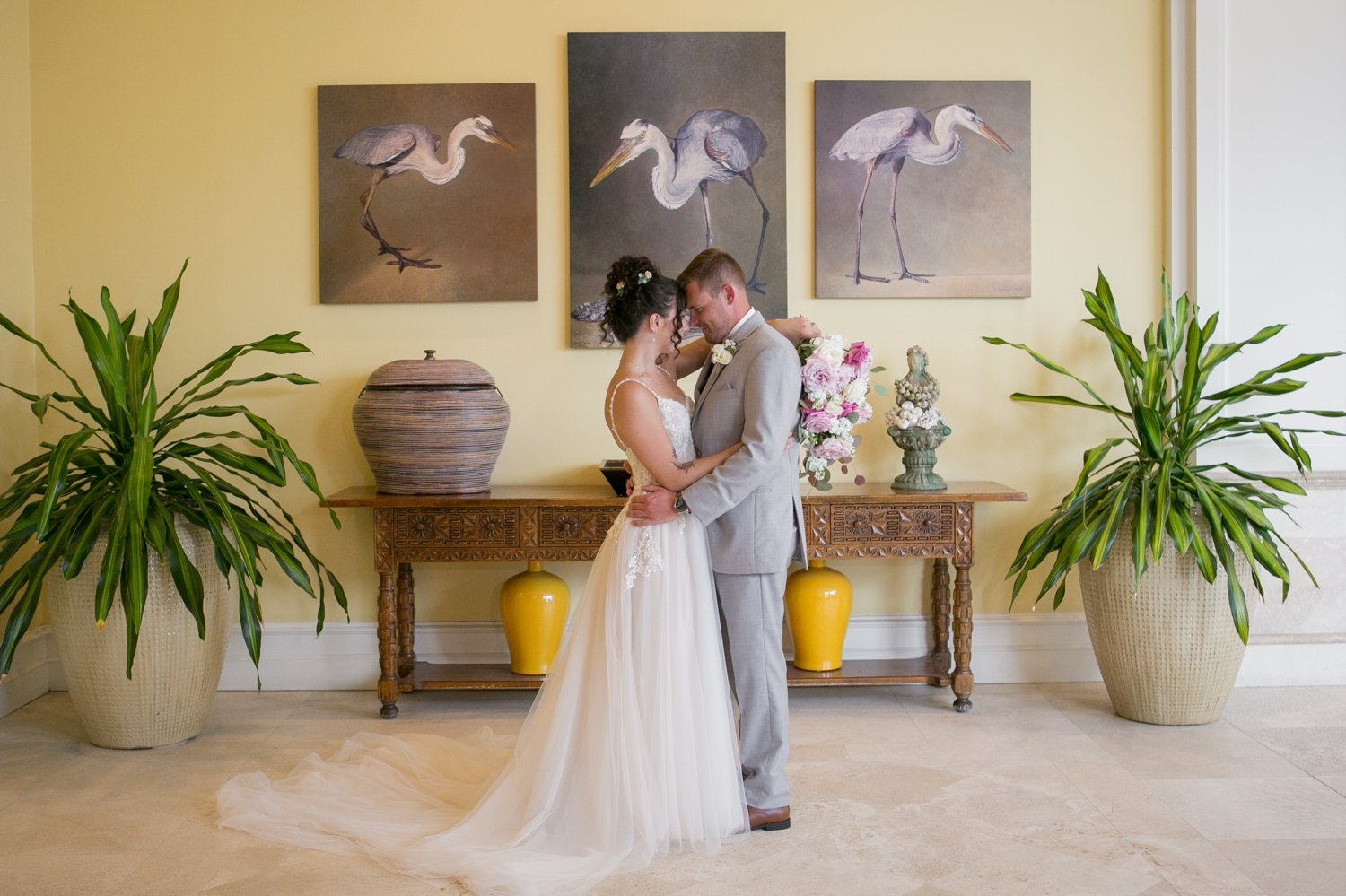 bride and groom photo inside the lobby at the sand pearl resort