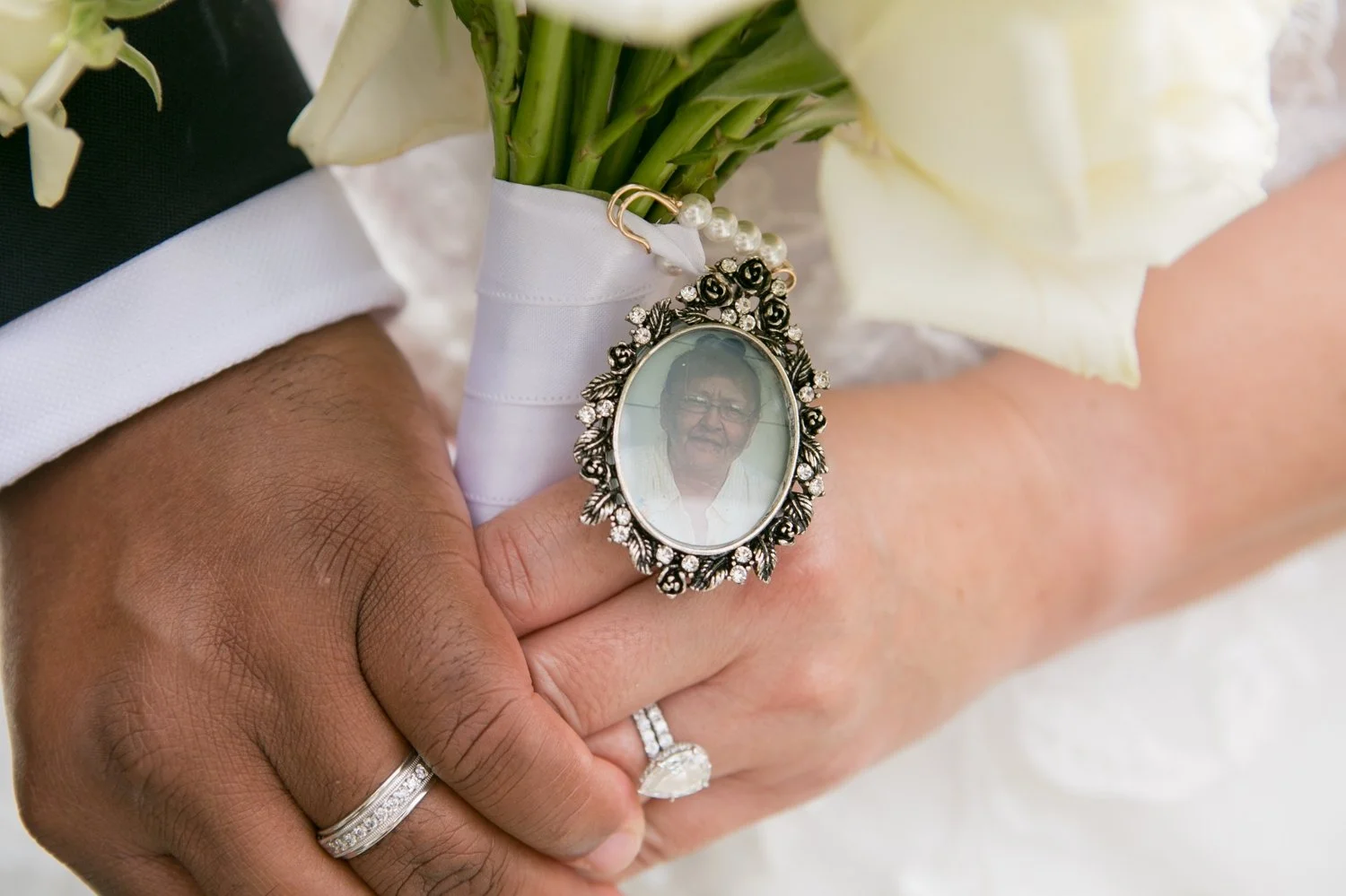 the bouquet brooch close-up. This is your most emotional image and it earns its own moment.