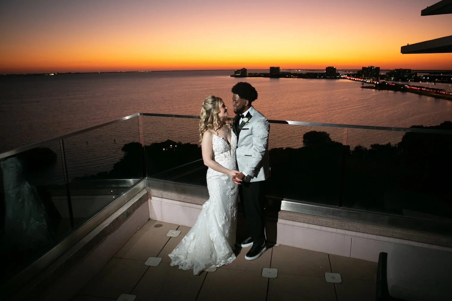 Rooftop sunset at a Grand Hyatt Wedding of a couple who just got married.