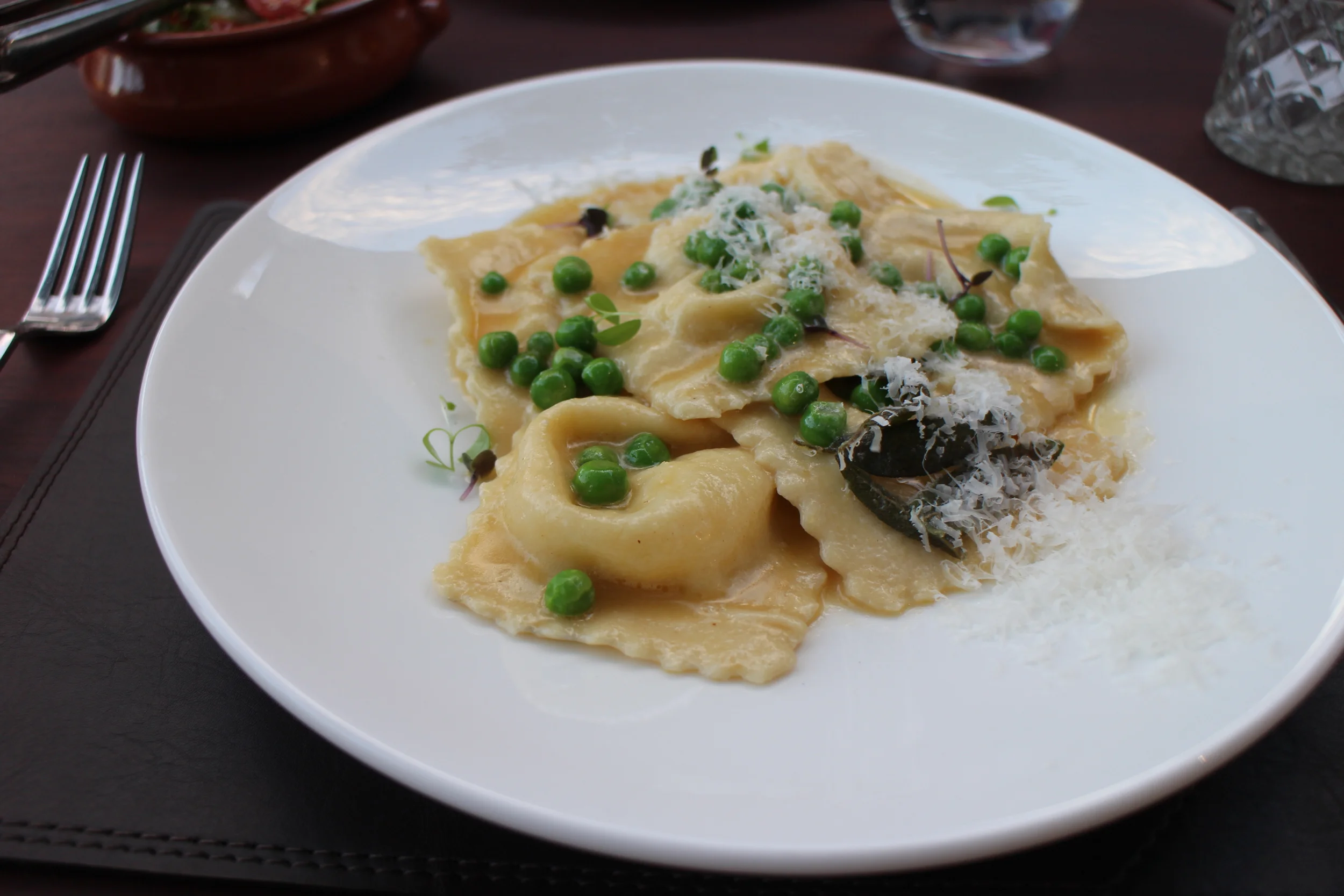 Burnt sage and pea ravioli