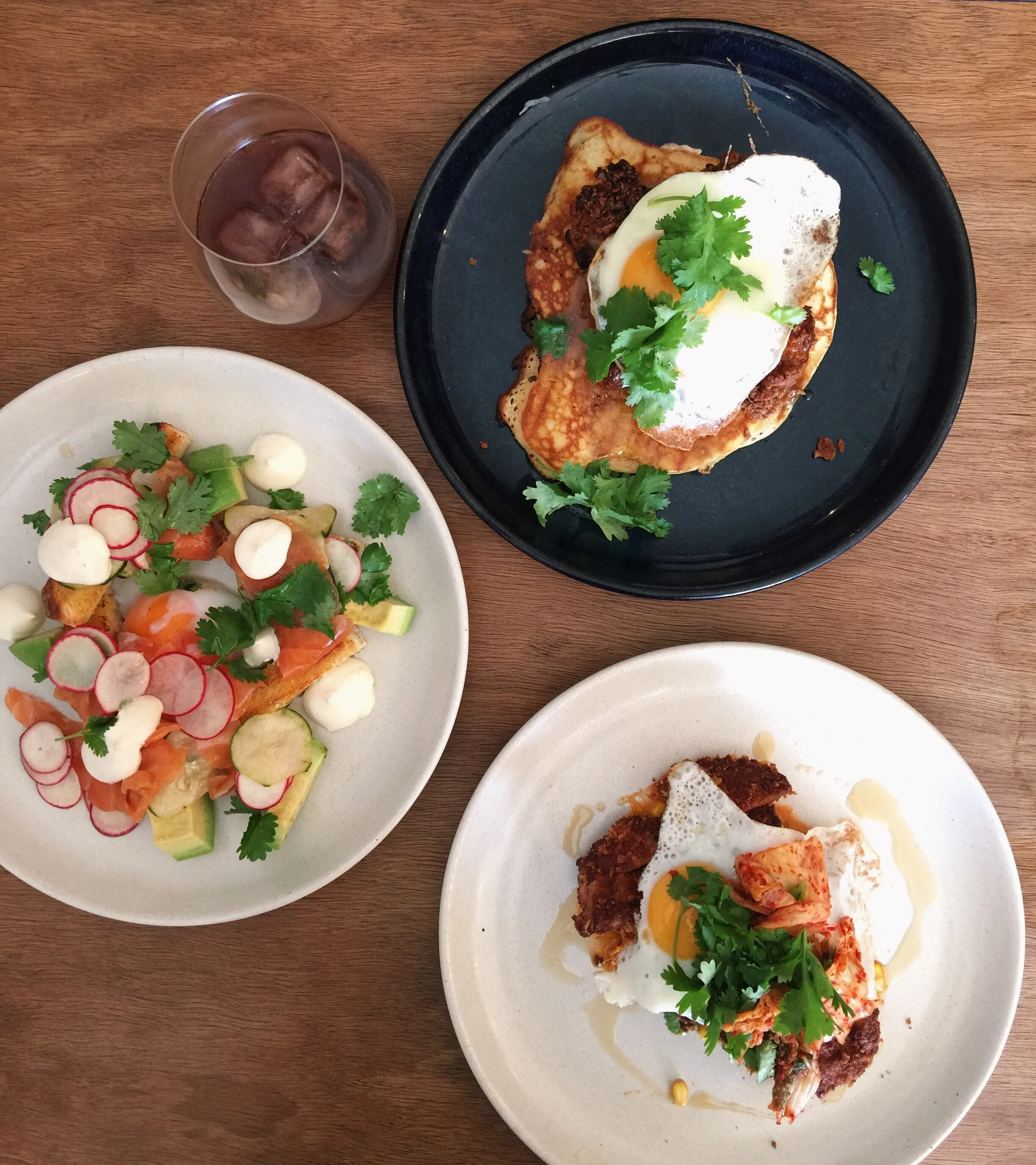 Mescal cured salmon slow egg avocado jalapeño lime toast, Cold drip coffee, Fried chicken buttermilk pancake peanuts maple butter fried egg, Pork snitzel creamed corn kimchi egg 
