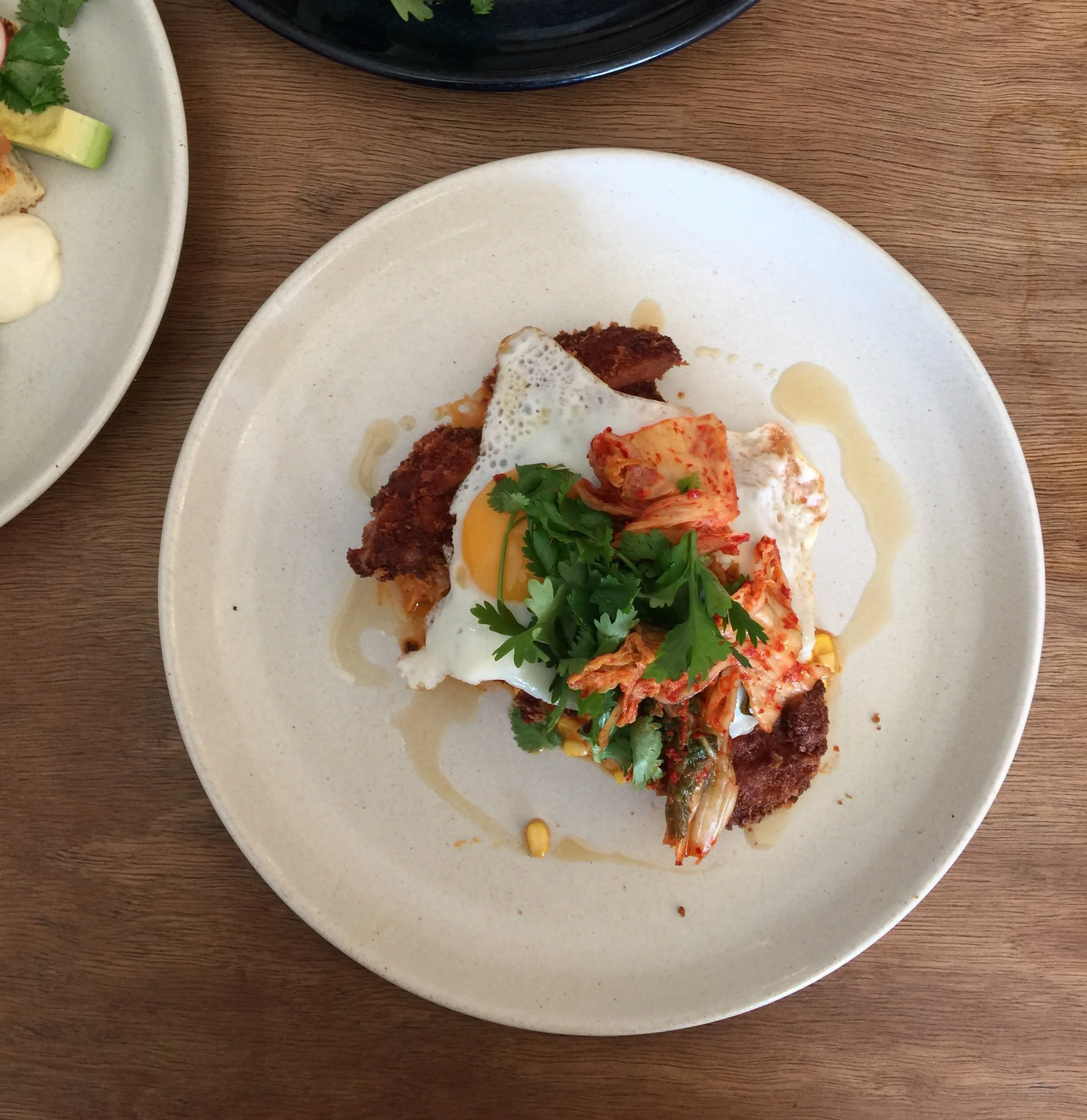 Pork snitzel creamed corn kimchi egg 