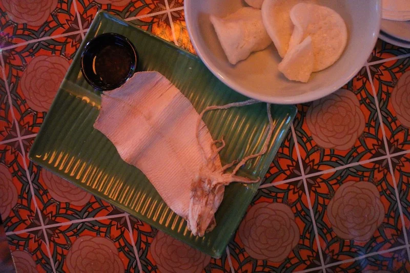 Plaa Meuk Ping - Charcoal toasted dried cuttlefish, run through the squid press to tenderise