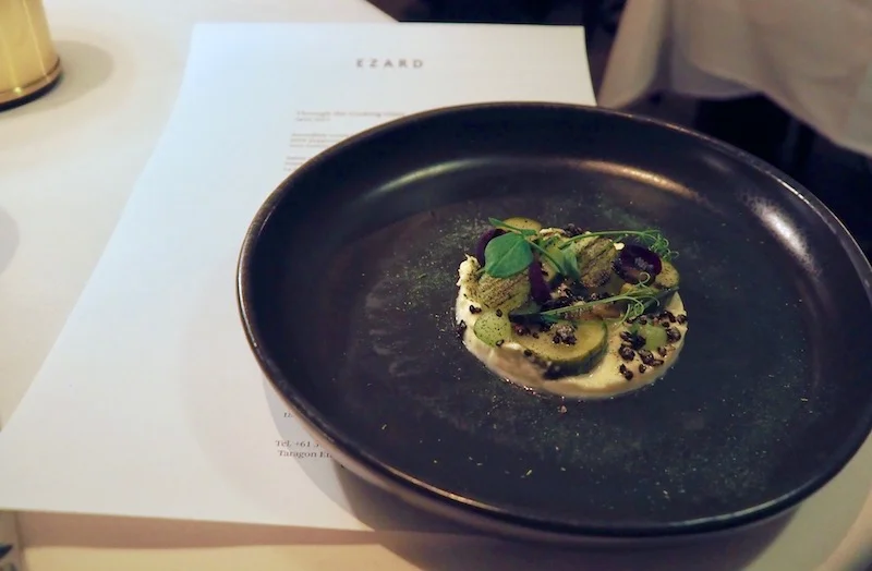 Salad of fermented cucumber, stracciatella, burdock root, toasted black sesame, dill 