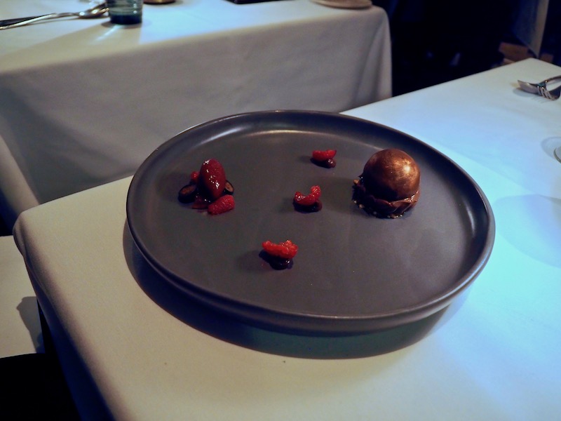 Dark chocolate sphere, chocolate cream, smoked peanut caramel, plum wine jelly, blackberry