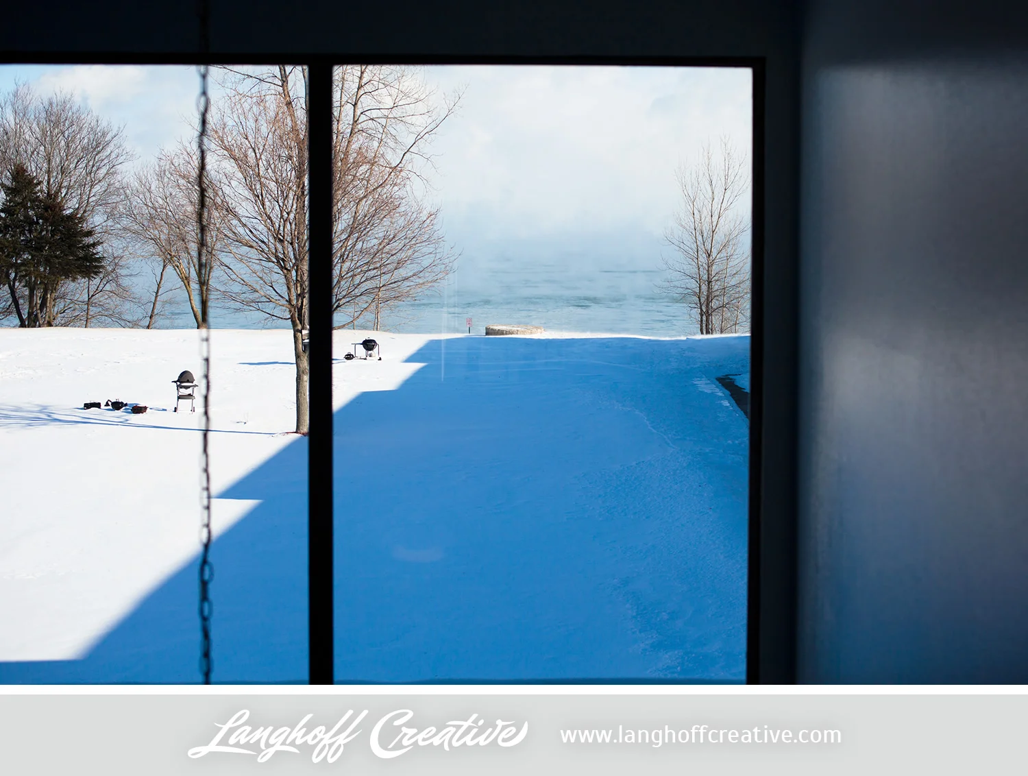 Click to view this image larger. (This is my view of Lake Michigan when peering through our apartment hallway from the second floor.)