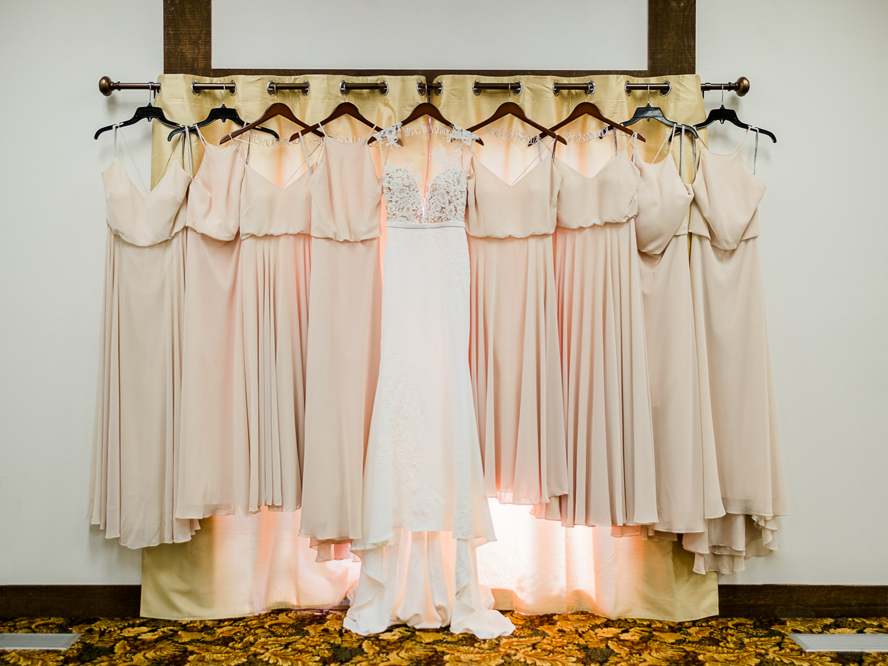  Wedding dresses hanging inwindow at Cragun's on Gull 