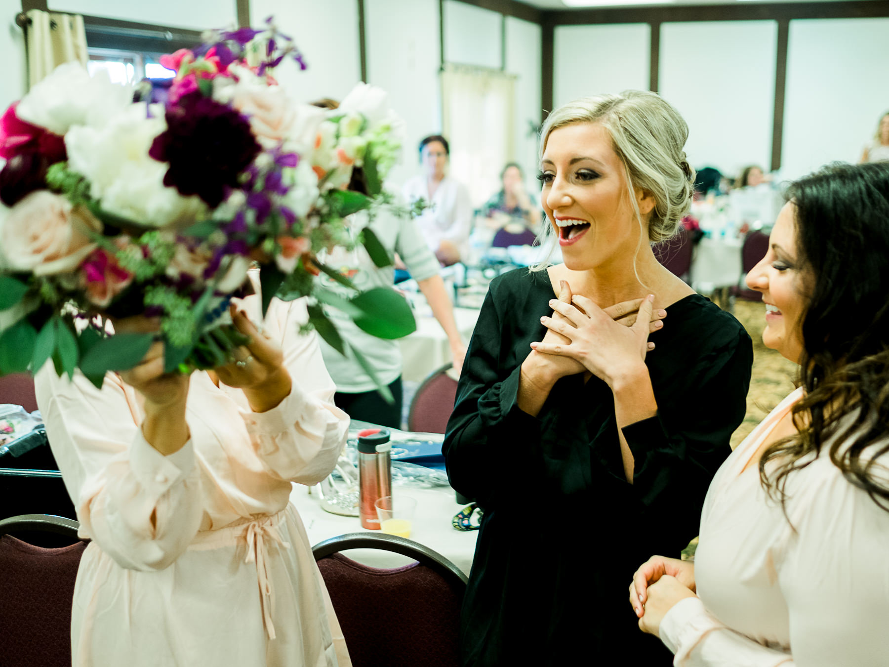  Bride receiving her bouquet from Bloom Designs  Cragun's Resort wedding in Brainerd 