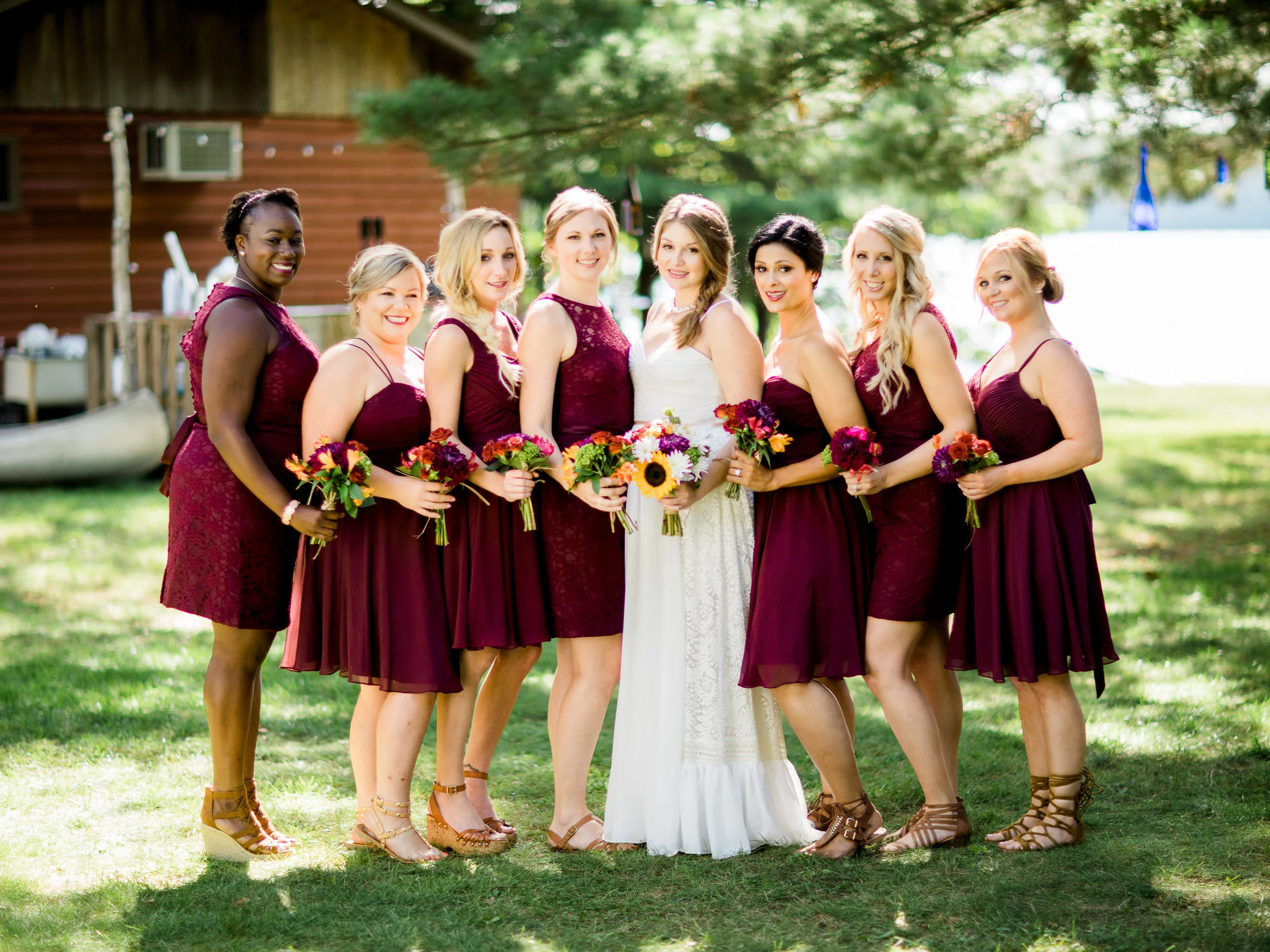 Bride with her bridesmaids at her Minnesota Lake Wedding