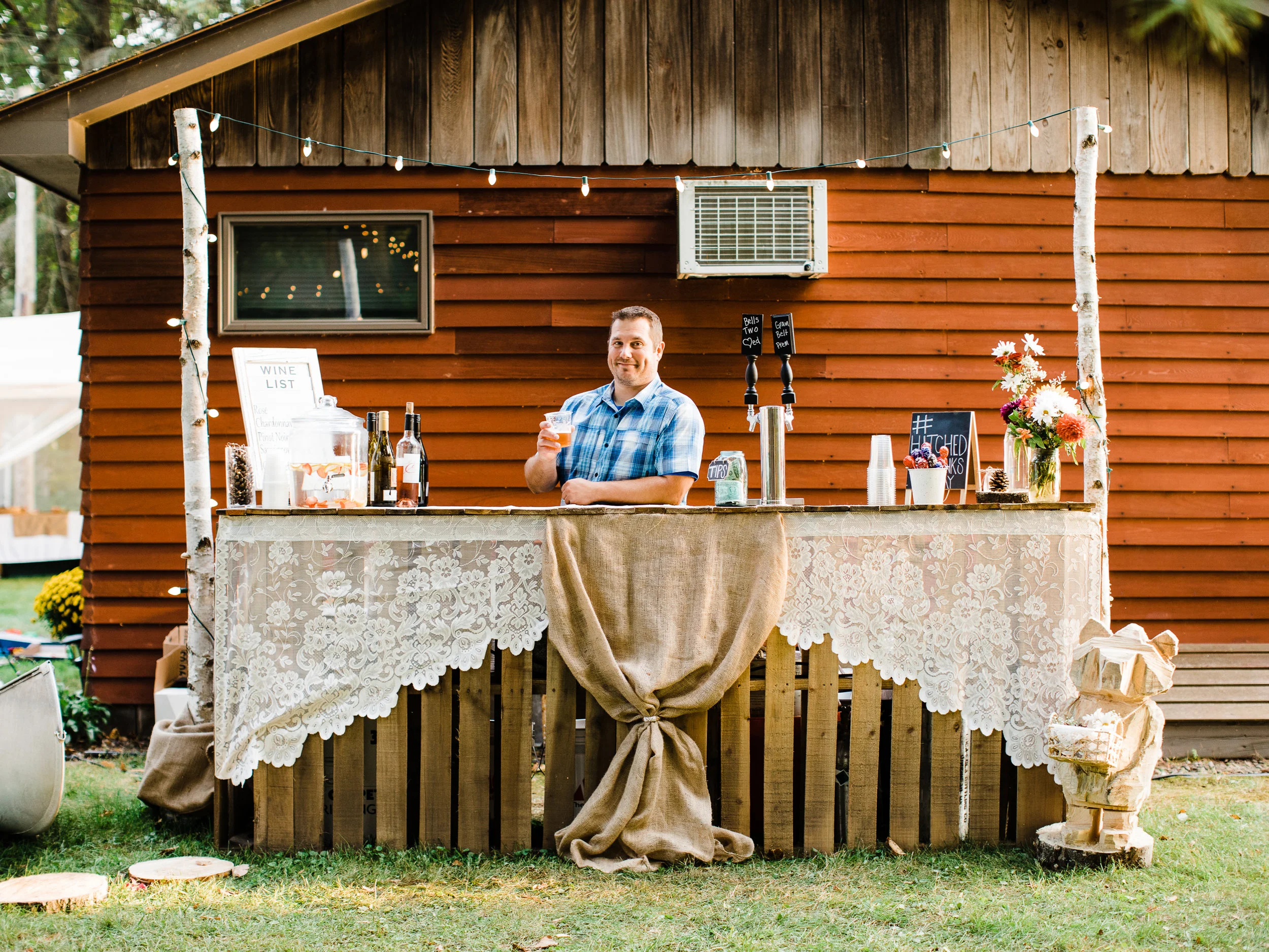 Northern Minnesota lakeside destination wedding reception in tent.