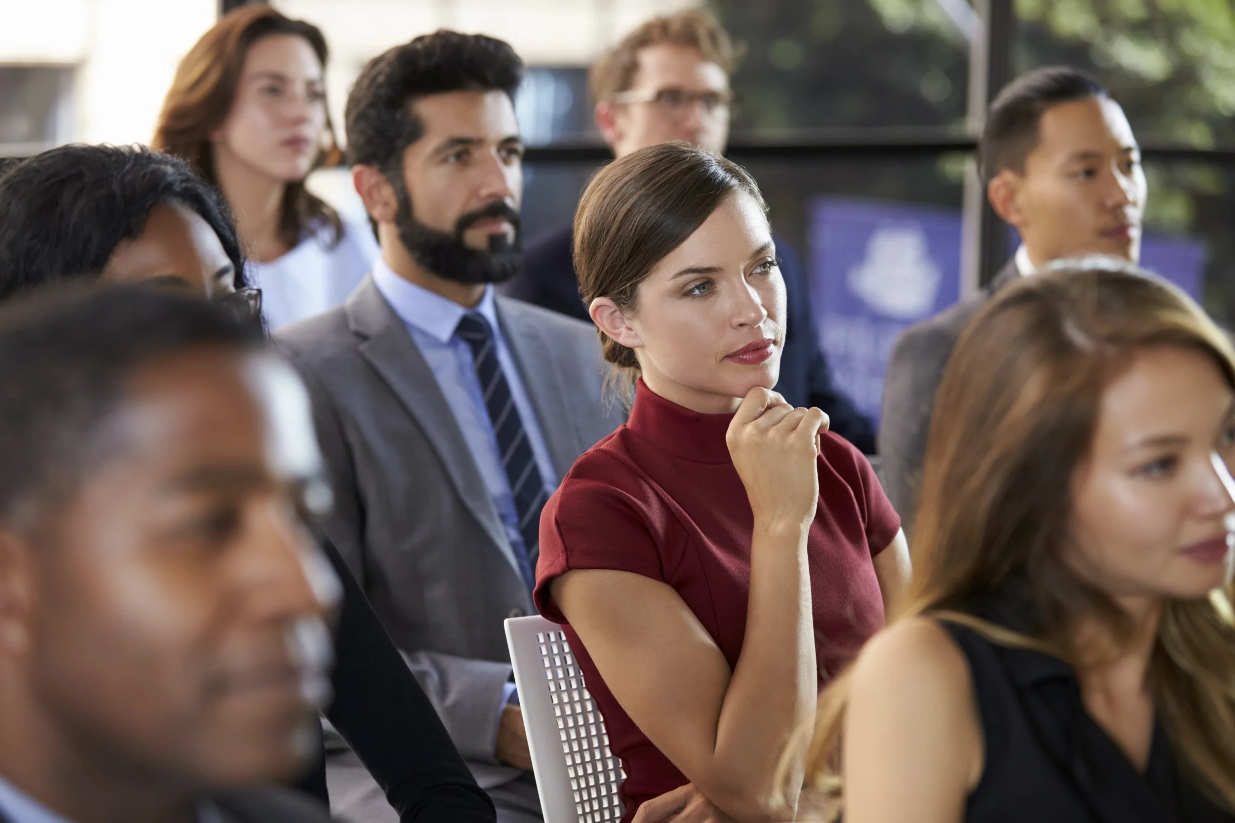 audience-at-a-business-seminar-listening-to-a-PQ35FBS-min.jpg