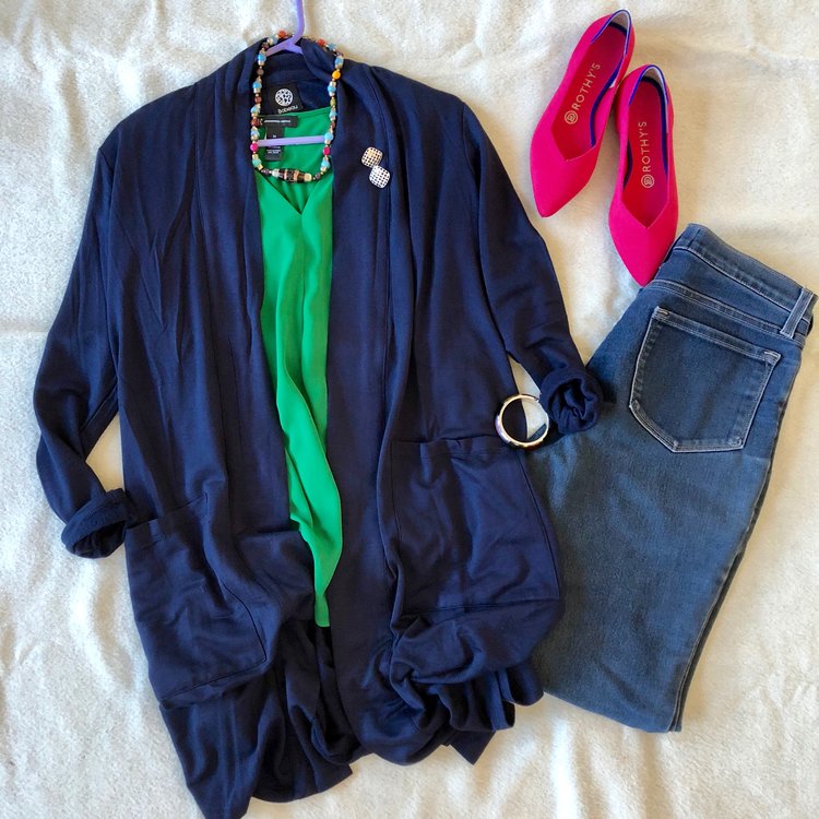 Play with warm and cool shades together with a green top, navy cardigan and pink flats - and multicolored jewelry amplifies the palette.