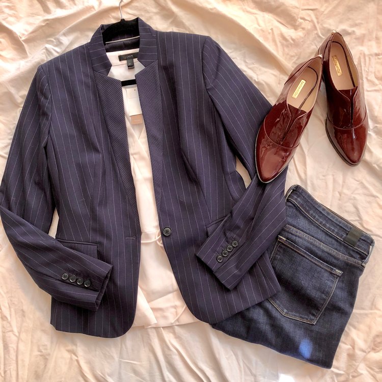 A tailored blazer is key in a business professional wardrobe, but it’s also ideal for casual date night with washed out blue jeans and cute flats.