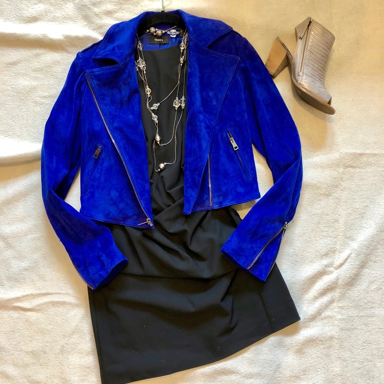 A classic little black dress isn’t for cocktail parties only - add some edge with a cobalt moto jacket and open toe booties for girls’ night out.