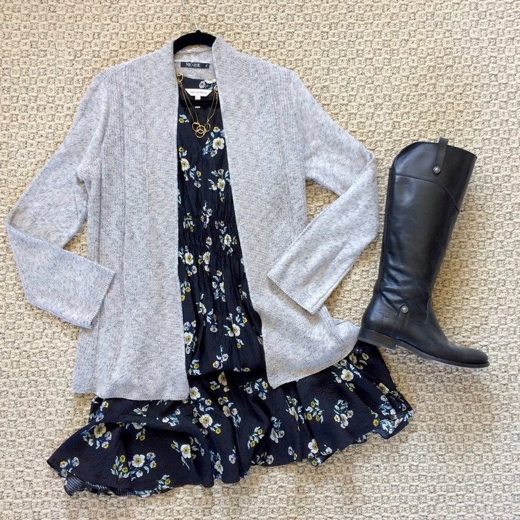 Your summer floral dress becomes winter friendly with a long cardigan, tights and knee-high boots.
