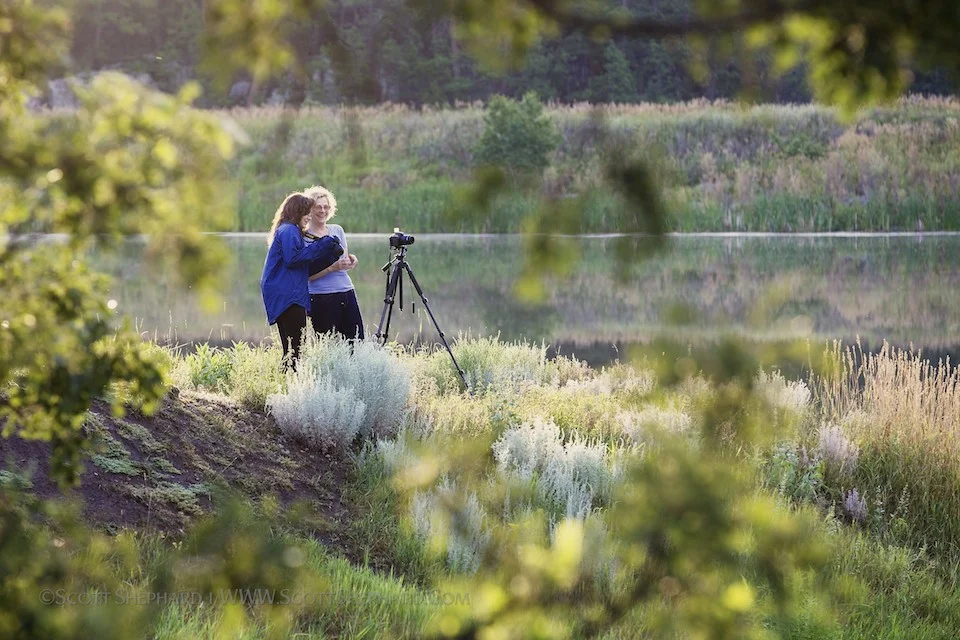 Patricia (Monterey, CA) and Nicole (Houston, TX) set up for an early morning shoot at Lakota Lake in the beautiful Black Hills of South Dakota. 2013 Black Hills Photo Adventure