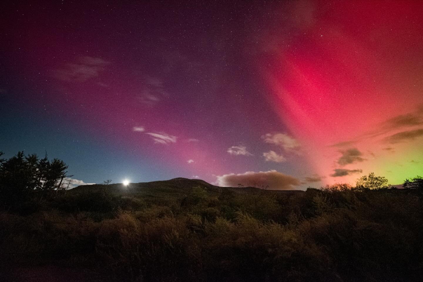 Moonset and a solar storm over the Catskill mountains. It was, as many of us experienced, a special kind of magic last night.