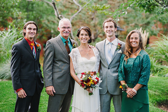 (Bride and groom with groom's family)