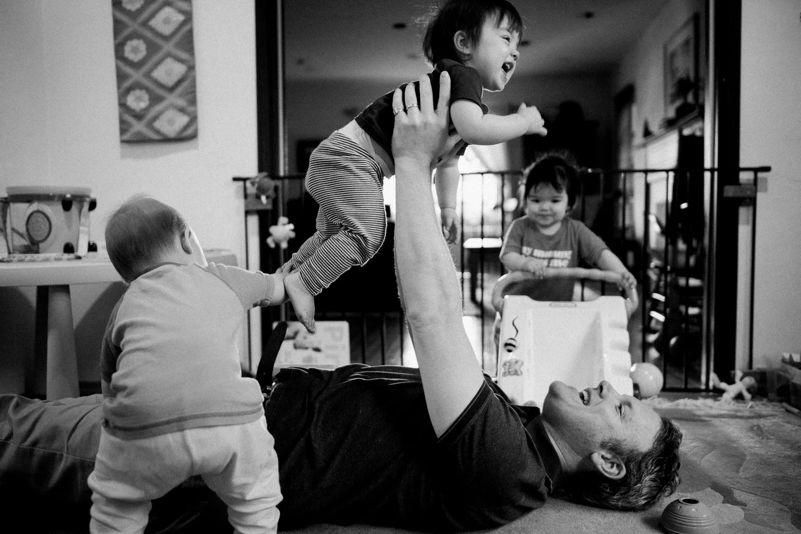 Father playing with children lifestyle family