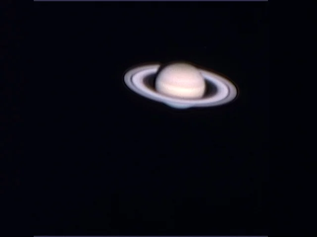 Through our telescopes, Saturn will look very much like this, with rings clearly visible.