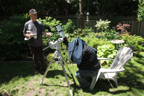 The centre's new solar telescope is checked out by Chris Maliicki and Gerard Foraie.