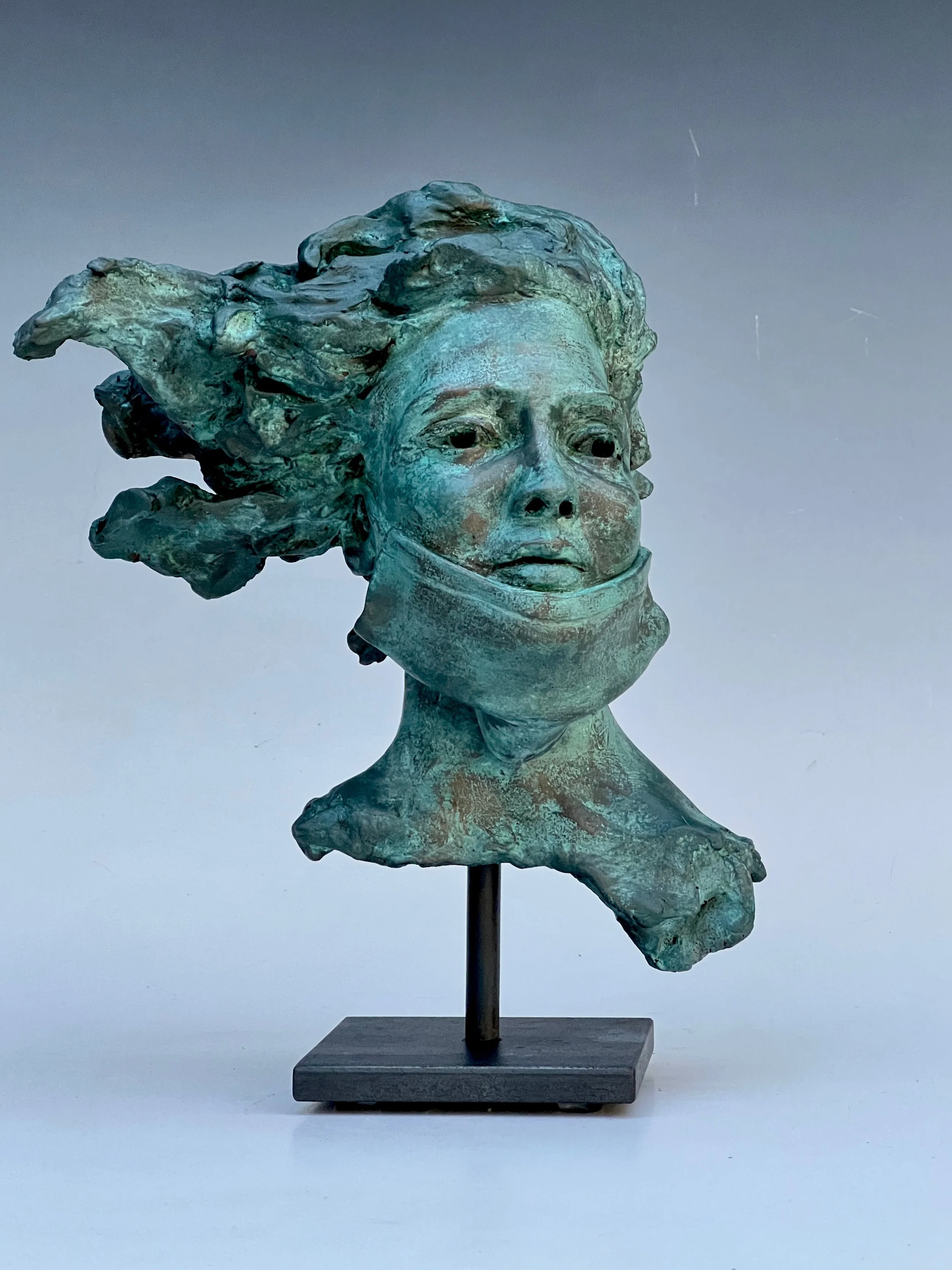 Woman with Mask- Weathered Bronz (Jade) patina- Bob Clyatt Sculpture.jpeg