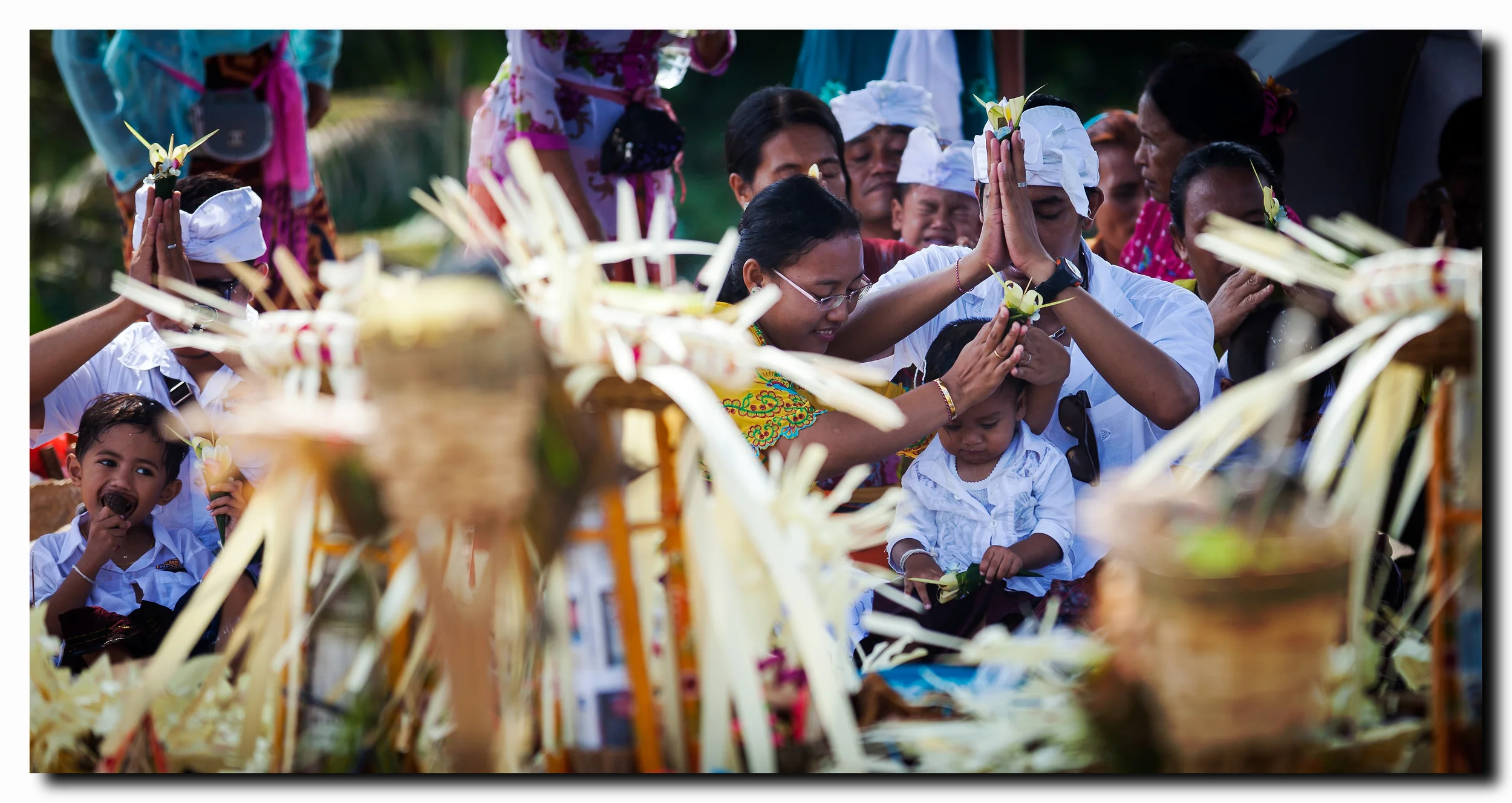 Hindu family ceremony on Seminyak beach