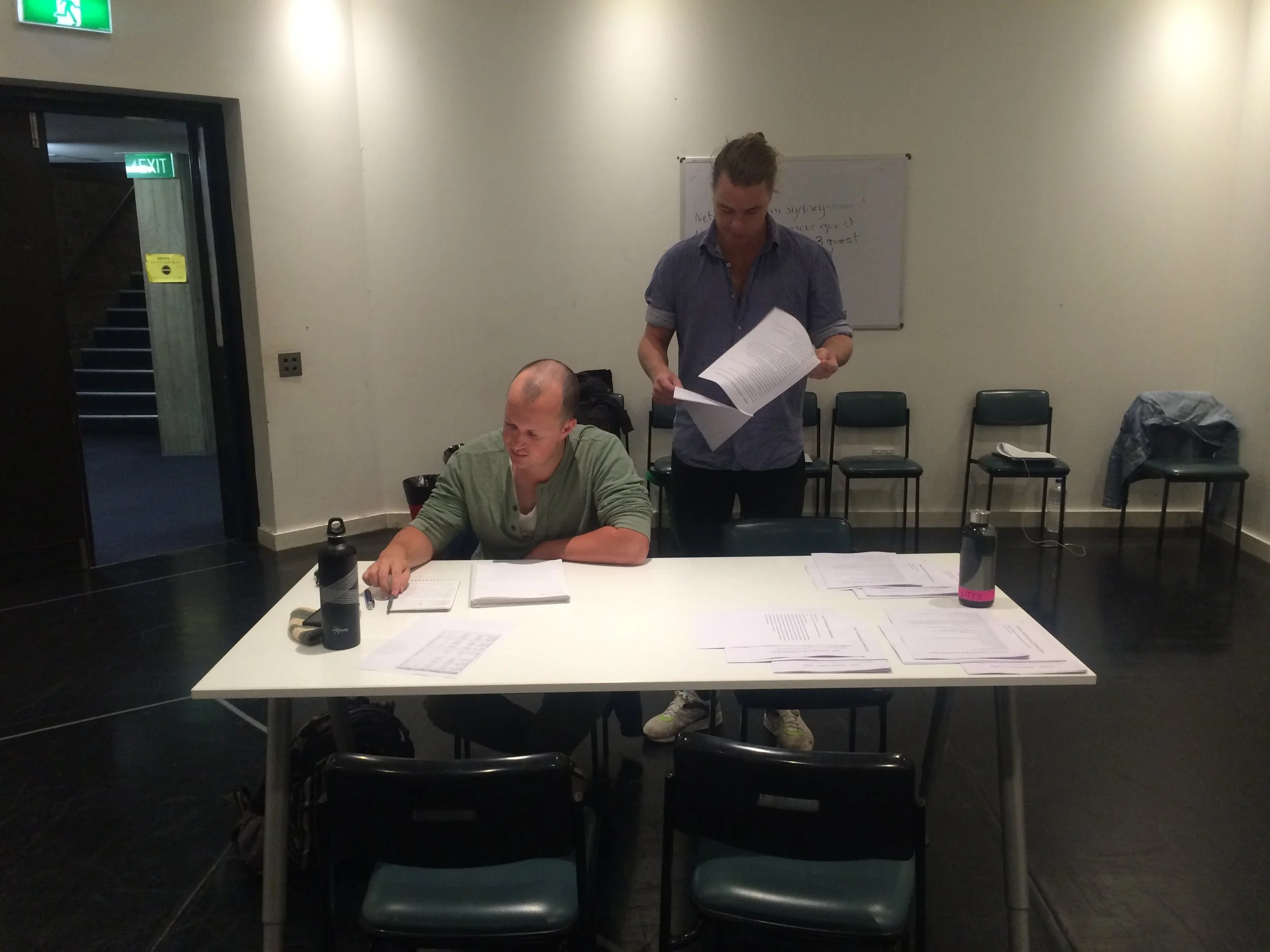 Director RIchard Cornally and reader Alex Shore prepare for auditions