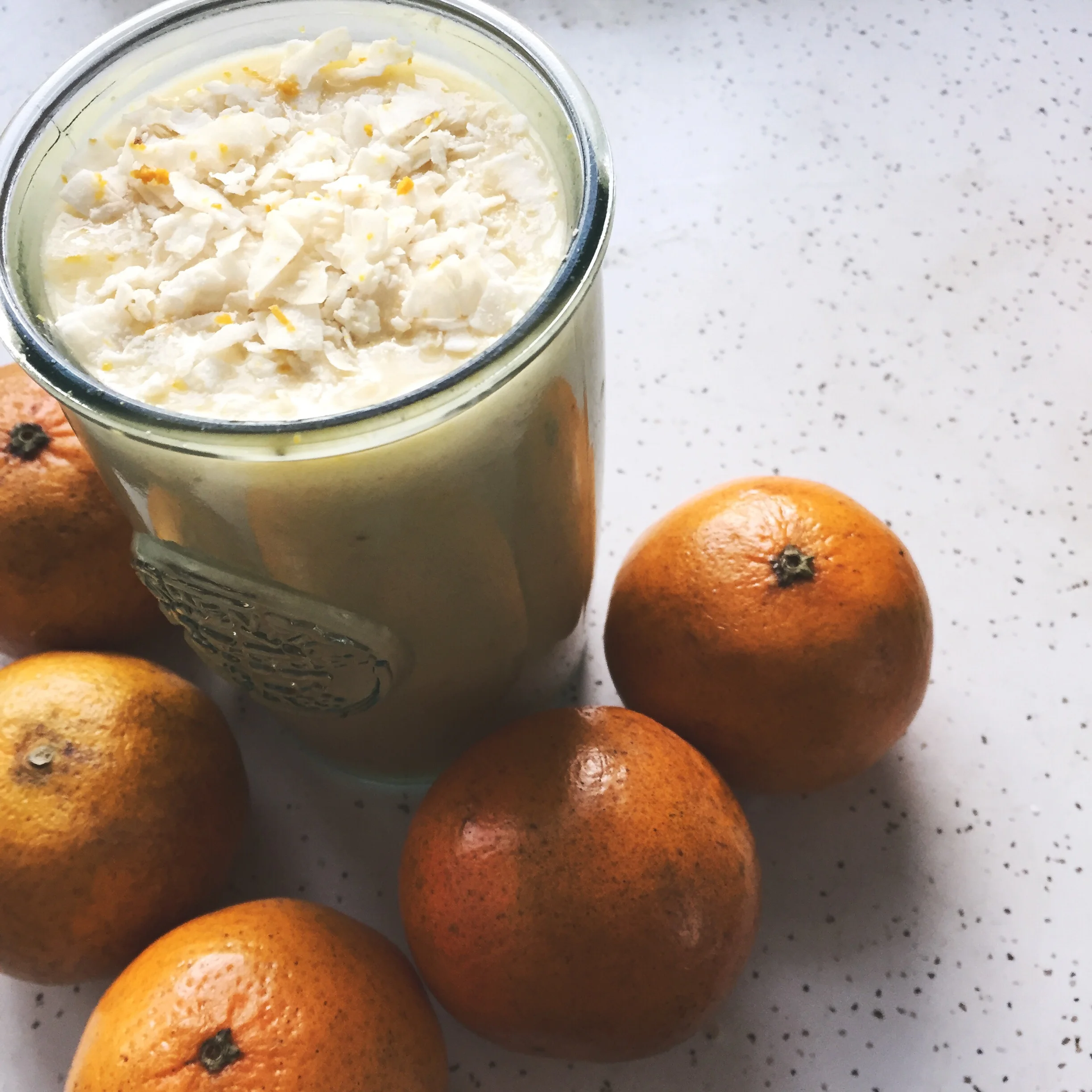 Tangerines and mangos! Reminding myself that winter won't last forever. 😊 ❄️💗☀️. Tangerine Mango Smoothie ~~ 1 frozen banana | 1 regular banana | juice of 1 tangerine | 1 mango | 1/4 tsp vanilla | 1 C coconut water or milk (I used canned today to make it a little thicker), pinch of salt, 1-2 T sweetener of your choice (maple syrup, date syrup, agave, honey, coconut palm sugar, or medjool dares for some low-glycemic options).