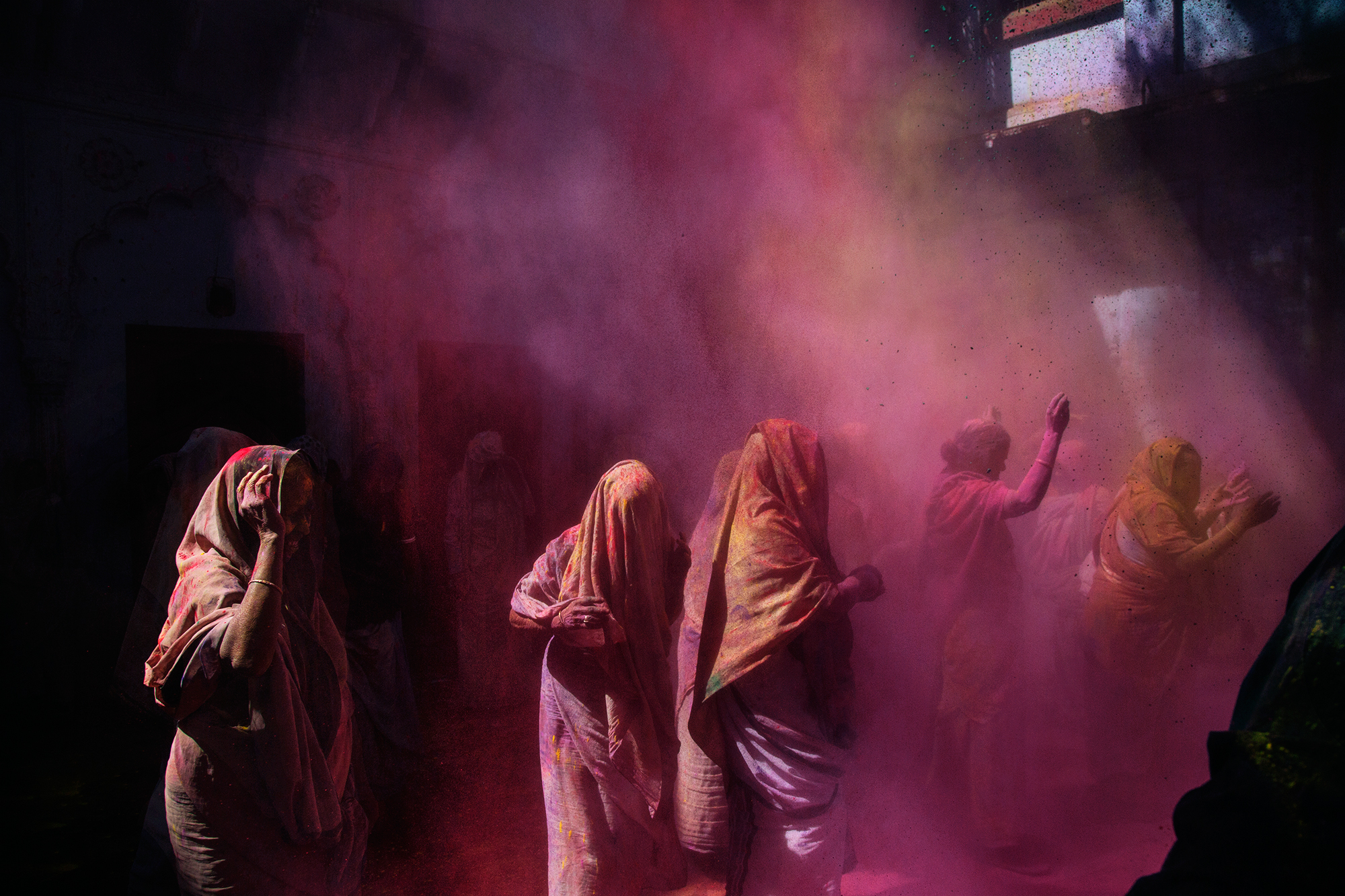  Widows from the Meera Sahabhhagini Ashram celebrate the Holi Festival in Vrindavan, Uttar Pradesh, India. Over the past years they have been encouraged to engage in celebrations by social organisations that are attempting to raise their status in co