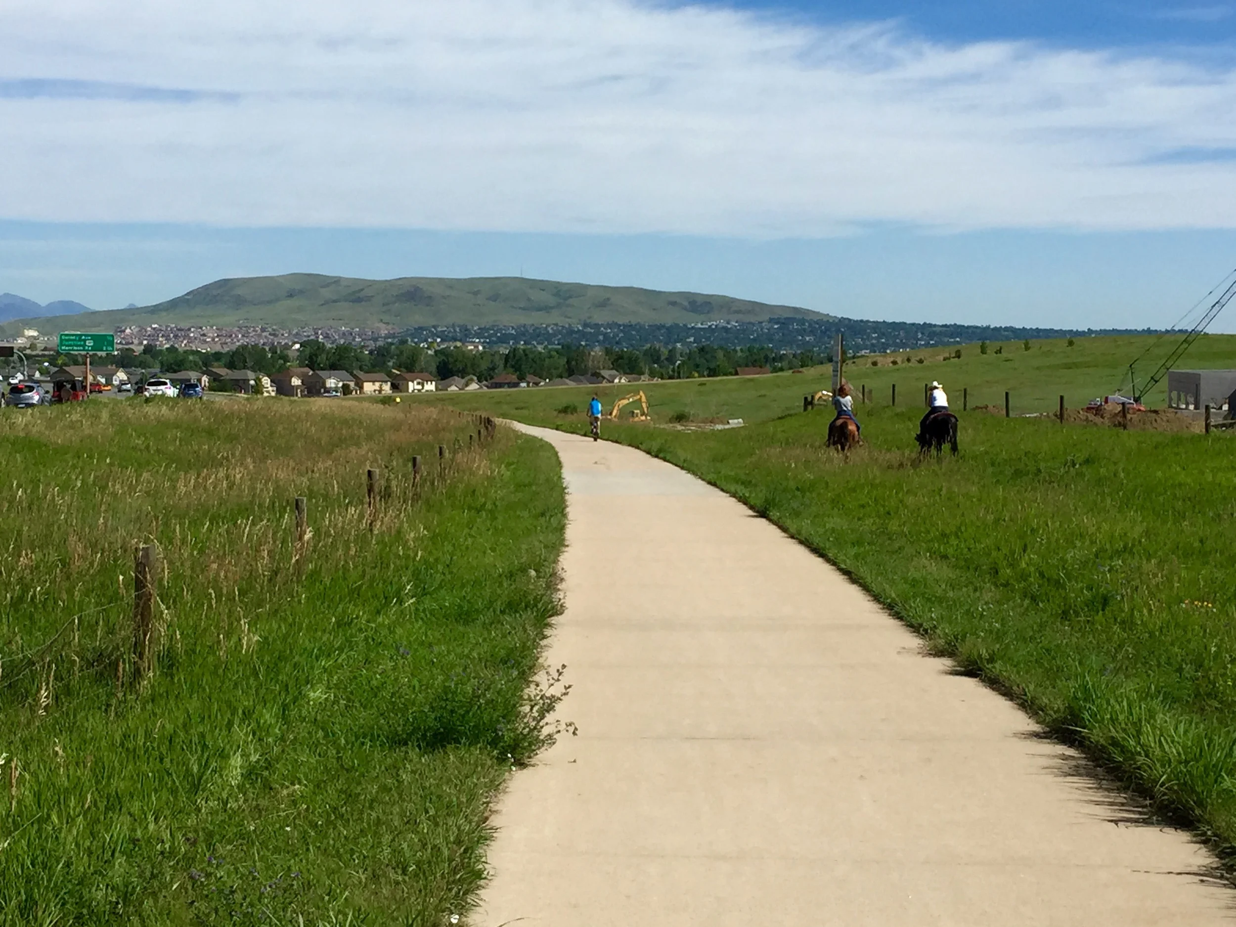 Sometimes motorists, cyclists, and even equestrians share the trails around Denver