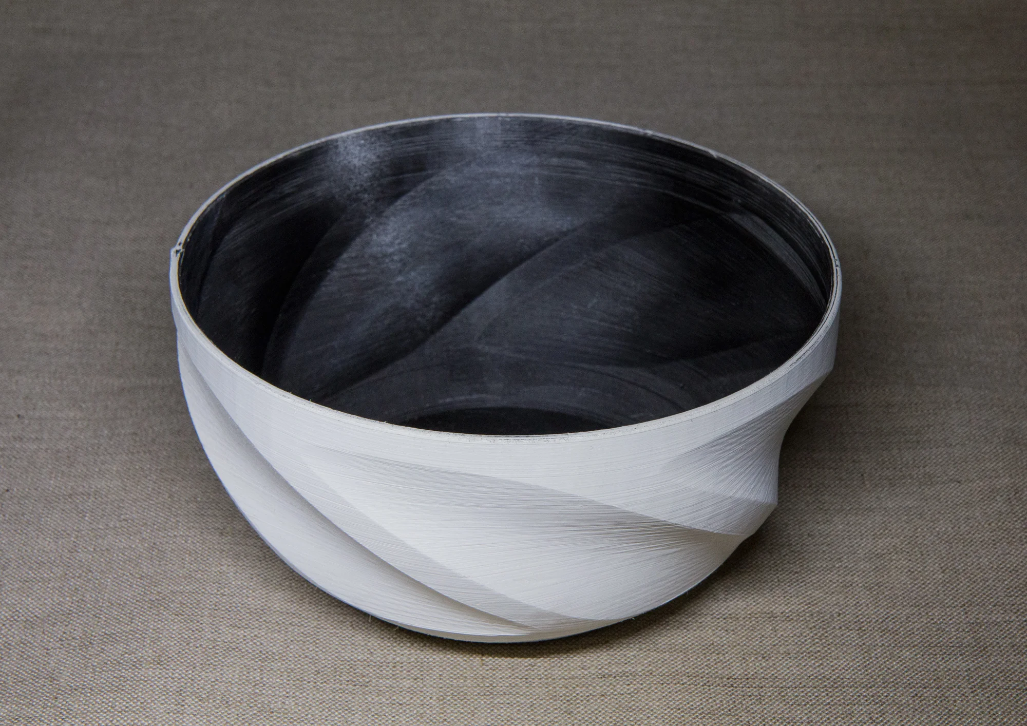 Printed on a BFB3000 using a high quality German PLA (175 °C) and sliced with KISSlicer. Spray painted black on the inside.