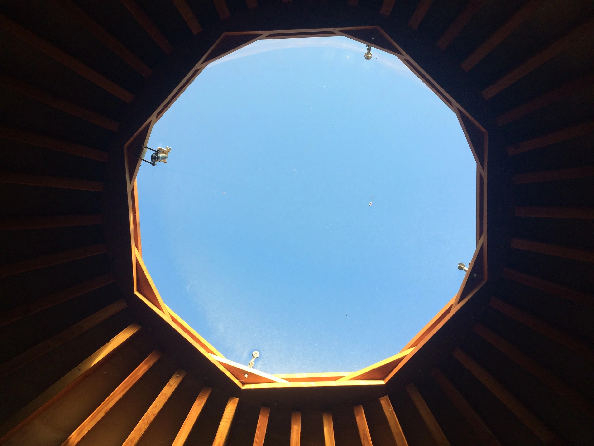 Blue skies by day, stars by night above my bed