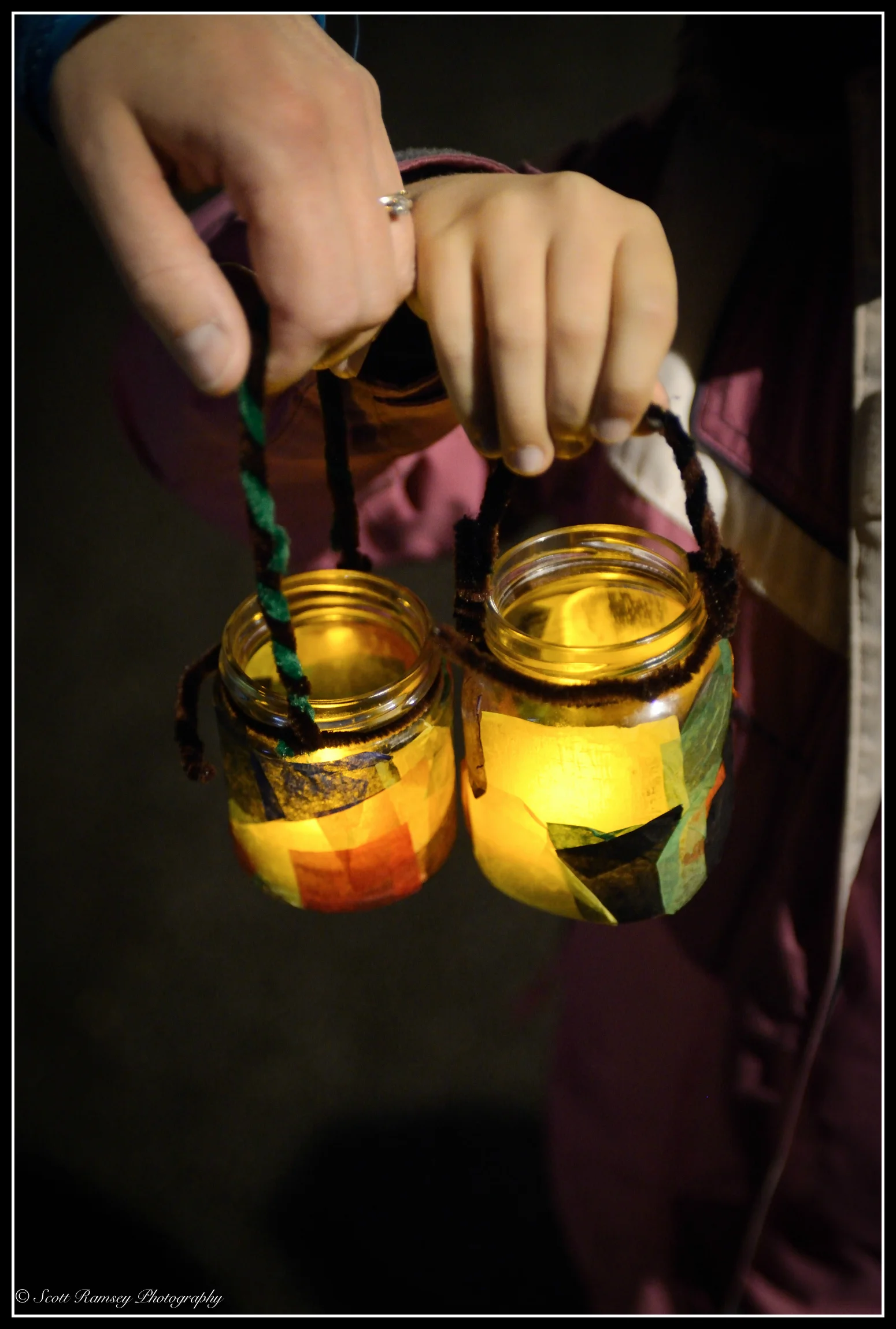 Children's lanterns help light the dark night during the East Preston Village Christmas celebrations.